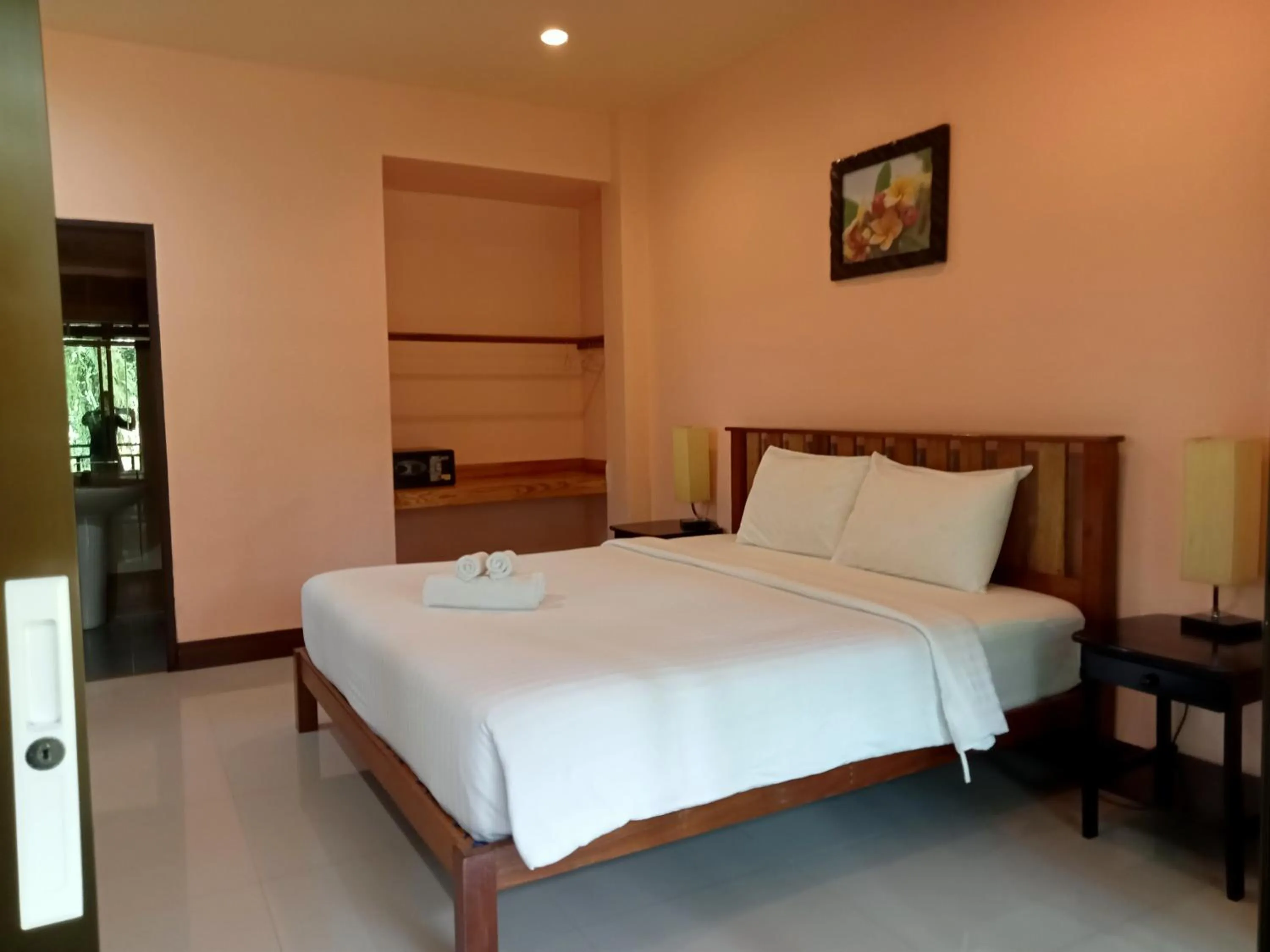 Bed in Khao Sok Palm Garden Resort