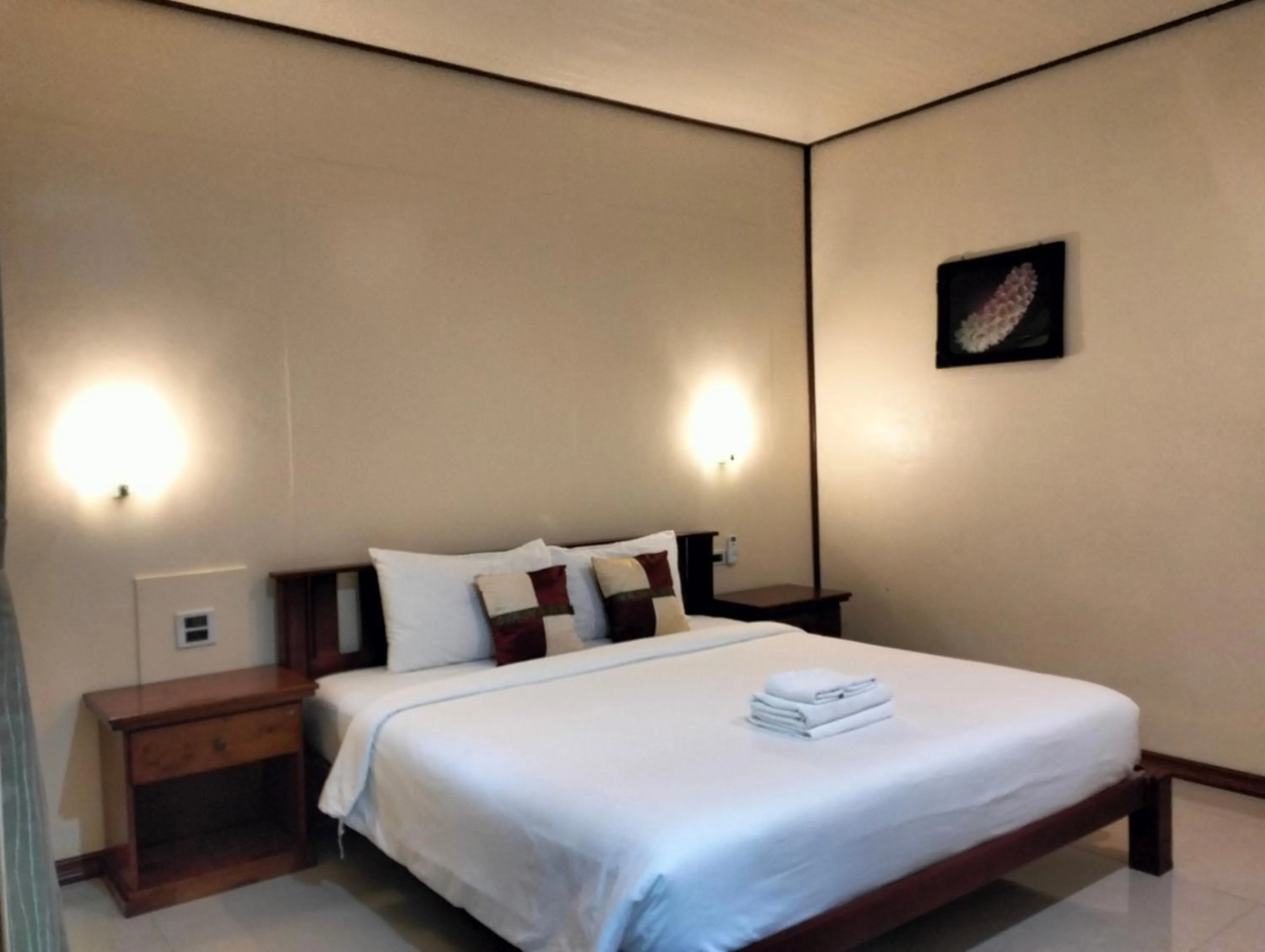 Bed in Khao Sok Palm Garden Resort