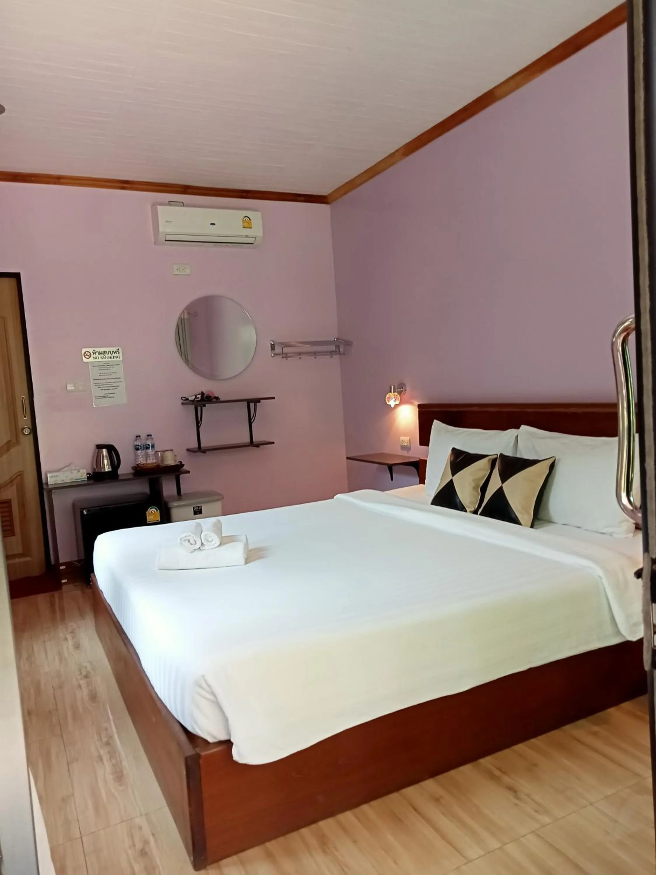 Bed in Khao Sok Palm Garden Resort