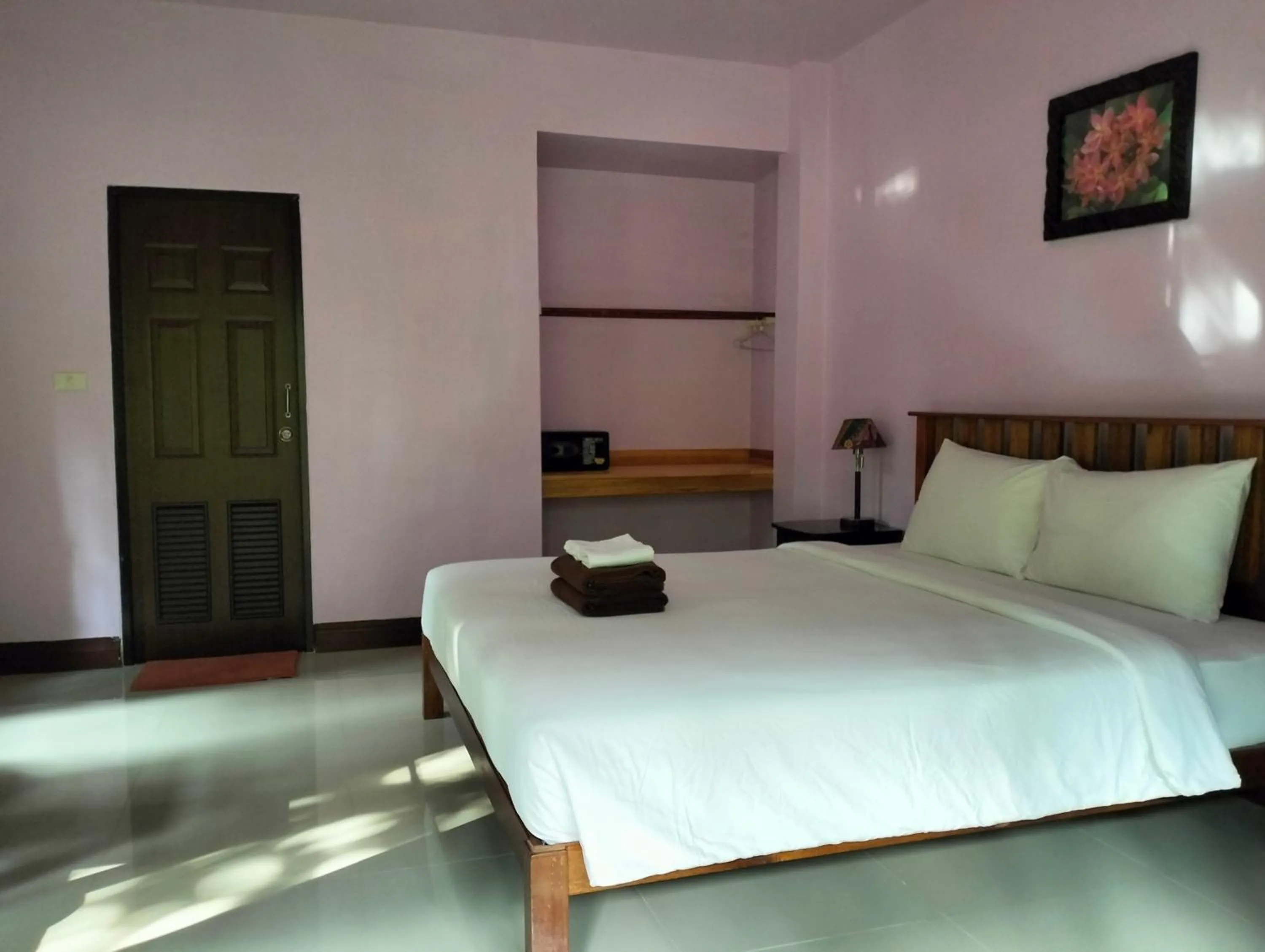 Bed in Khao Sok Palm Garden Resort