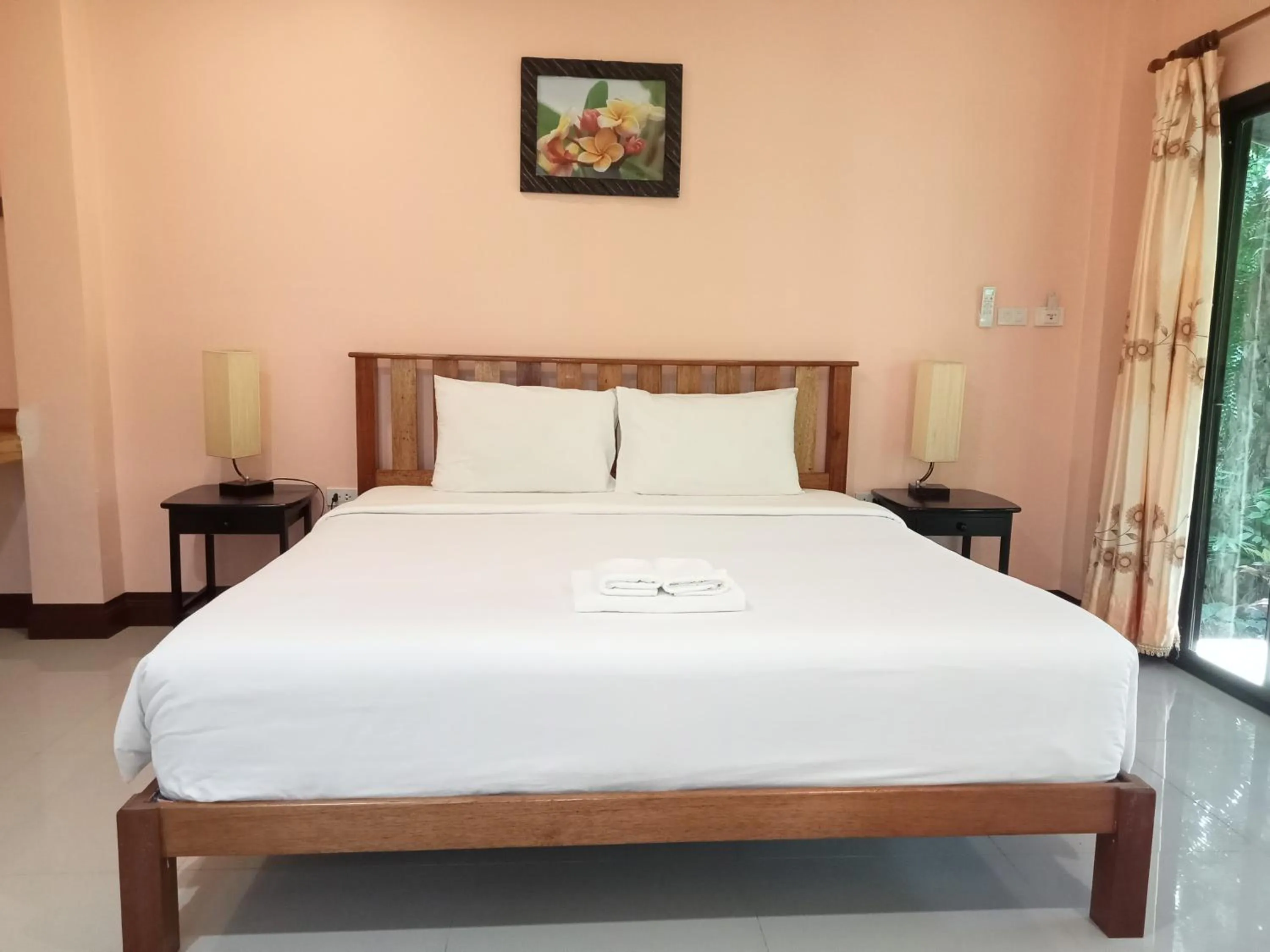Bed in Khao Sok Palm Garden Resort