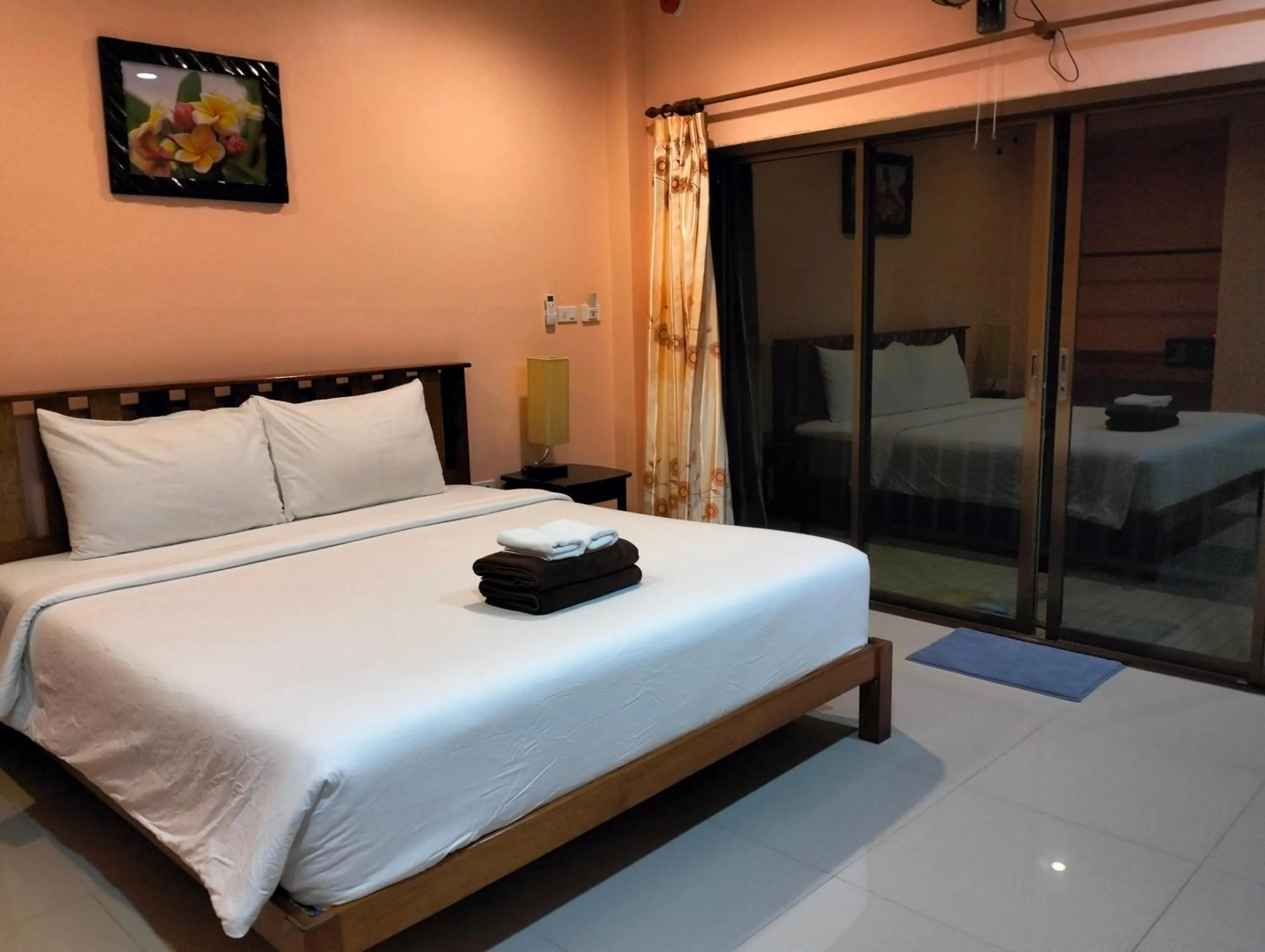 Bed in Khao Sok Palm Garden Resort