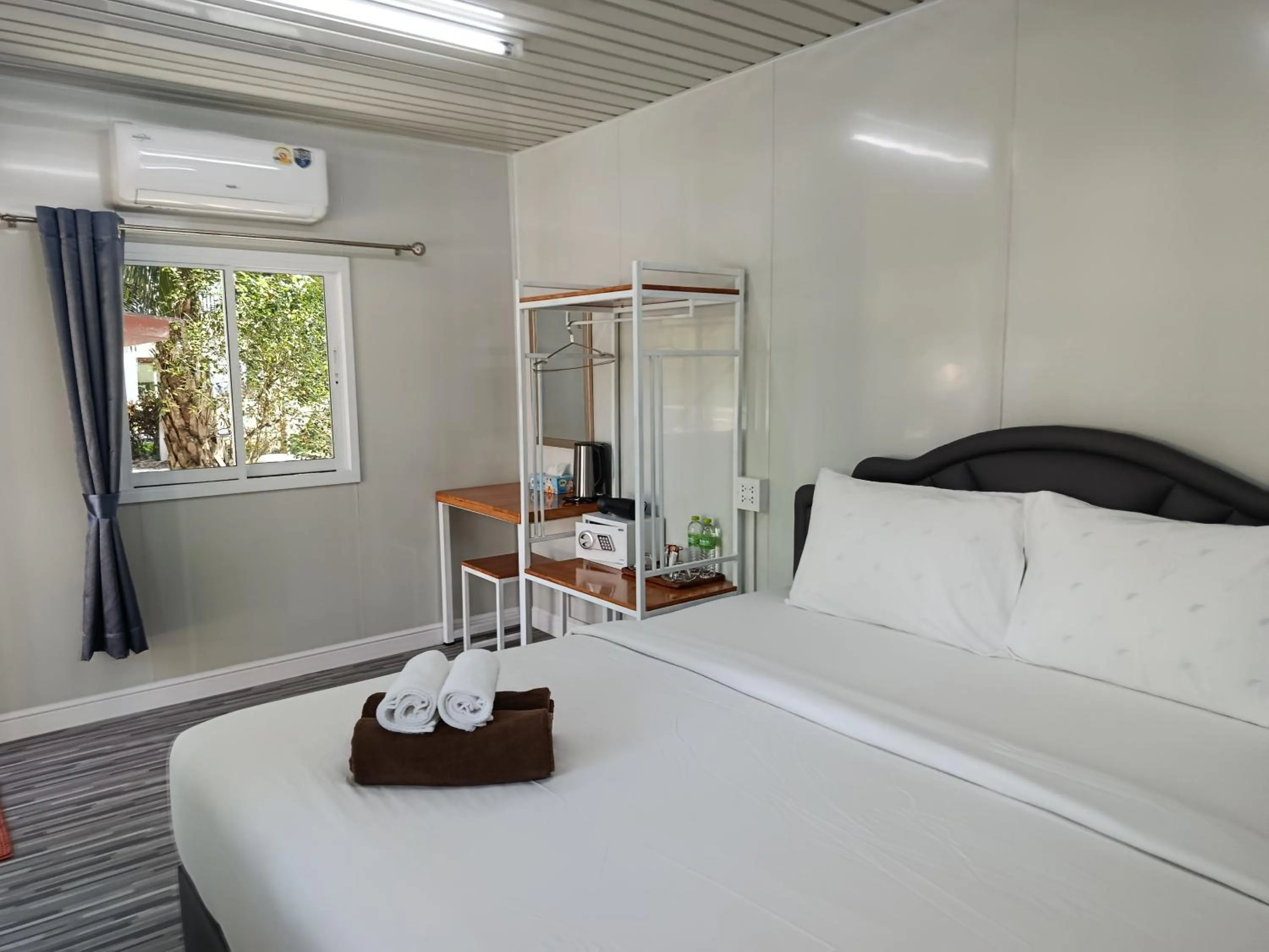 Bed in Khao Sok Palm Garden Resort