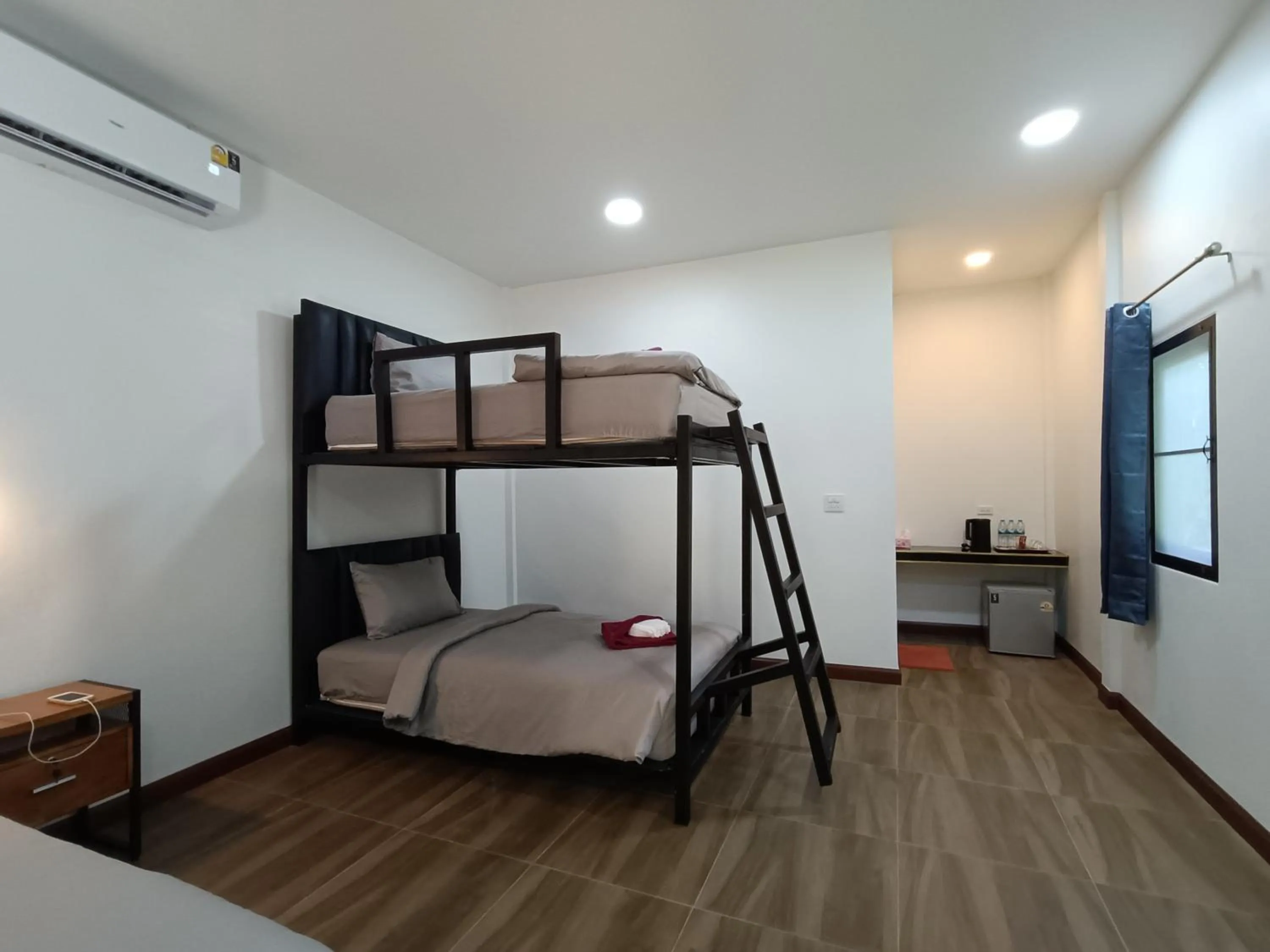 Bed in Khao Sok Palm Garden Resort