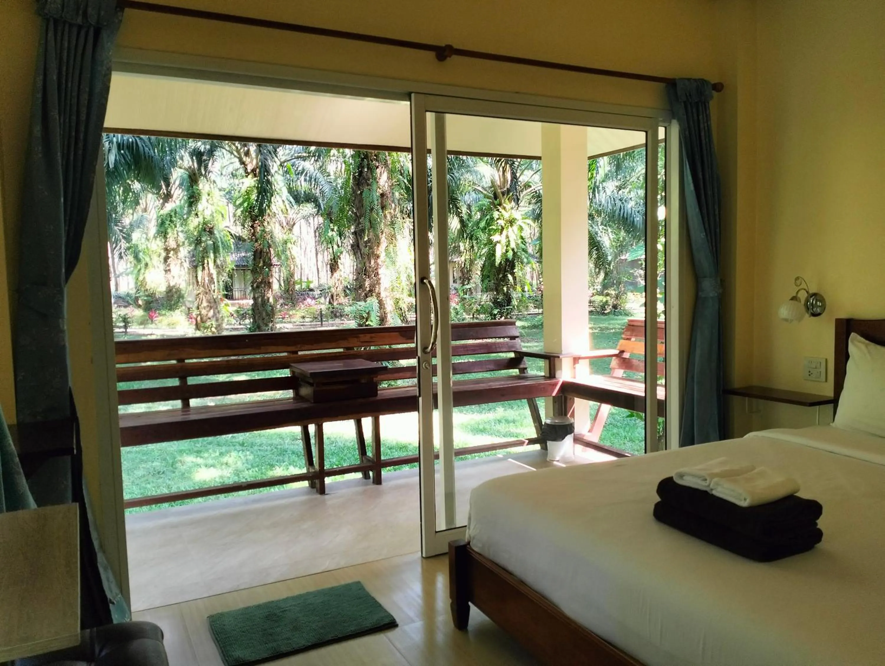 Bed in Khao Sok Palm Garden Resort
