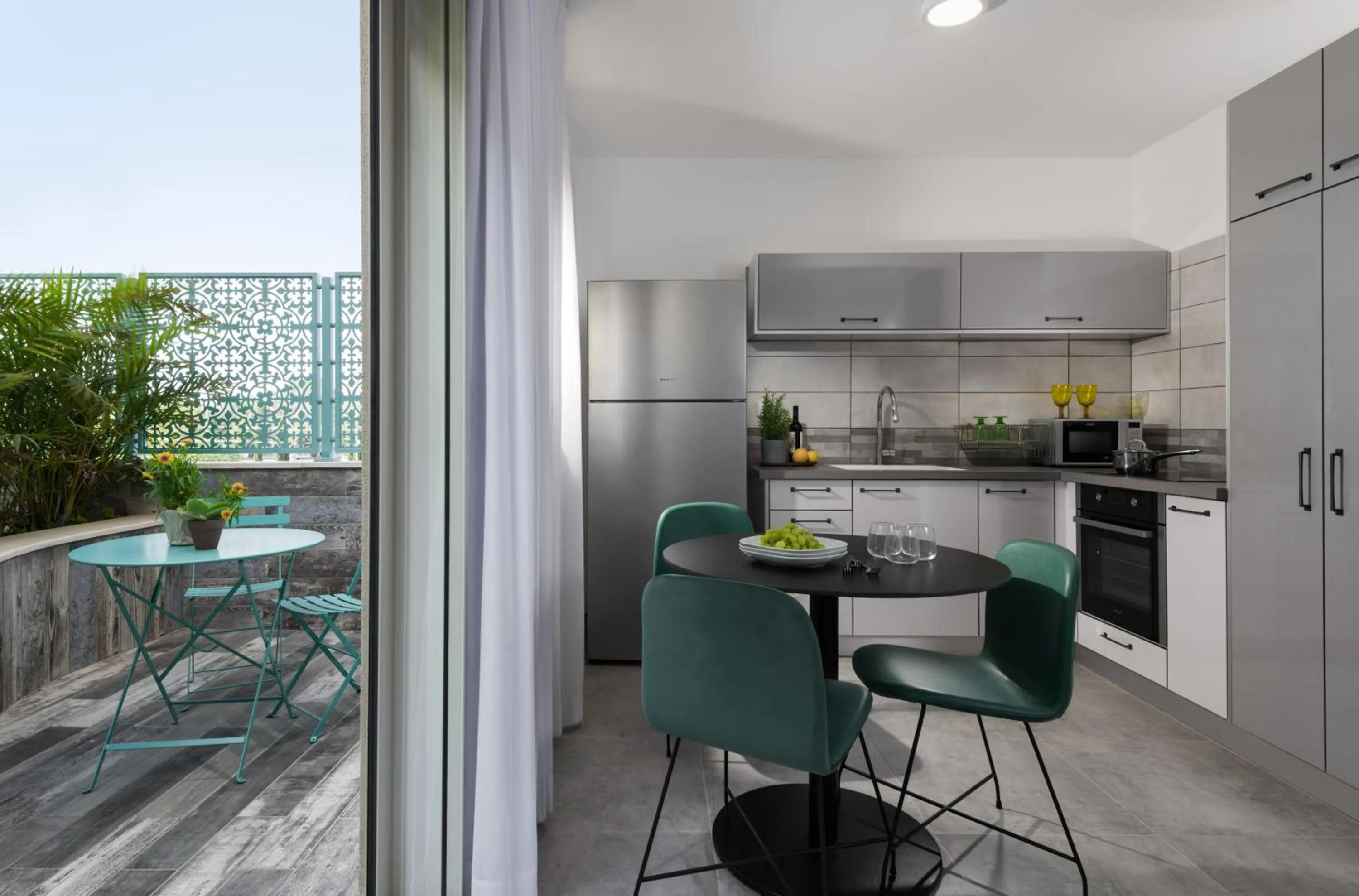 Kitchen or kitchenette in Herzl Boutique Hotel & Apartments by Domus