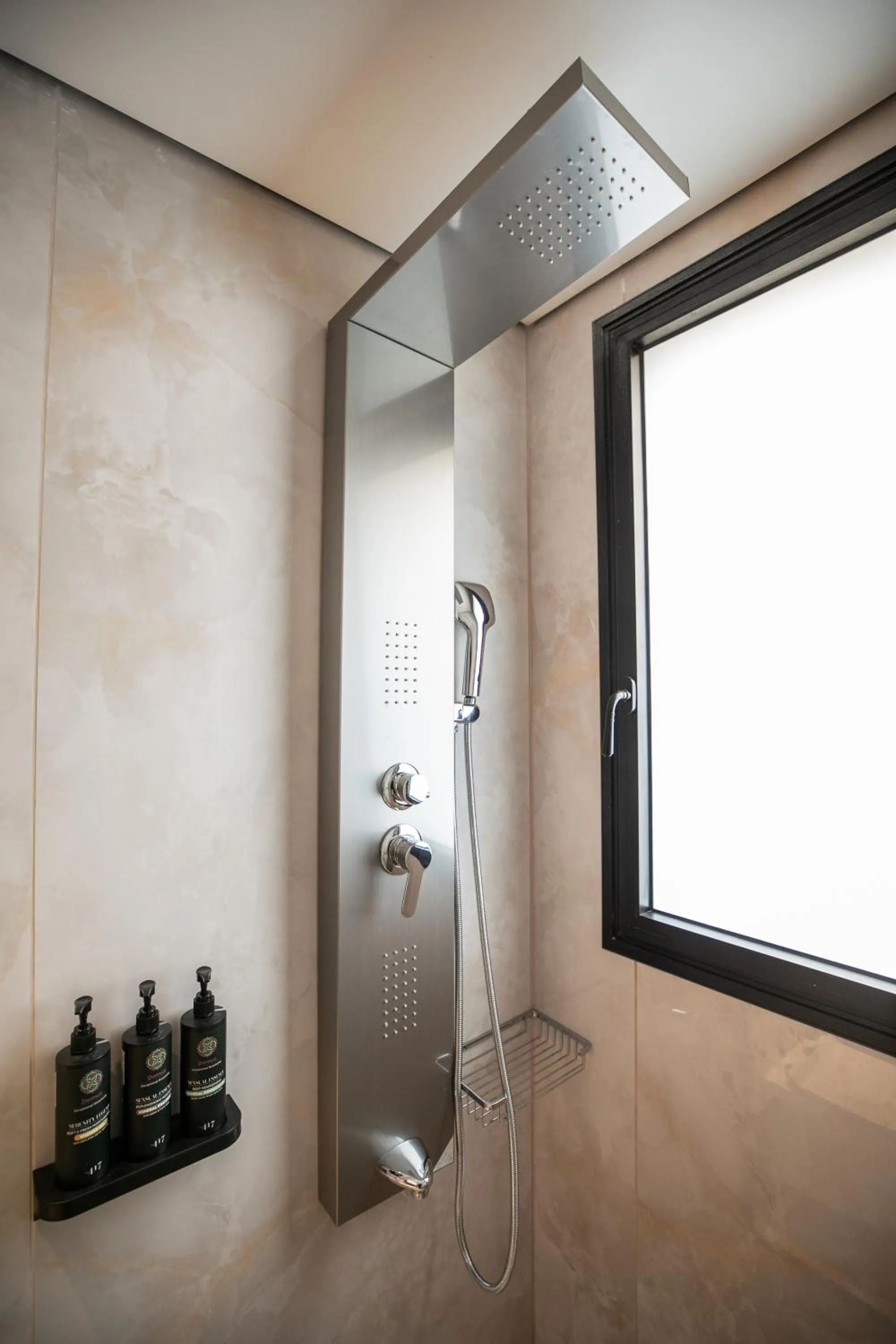 Shower in Herzl Boutique Hotel & Apartments by Domus