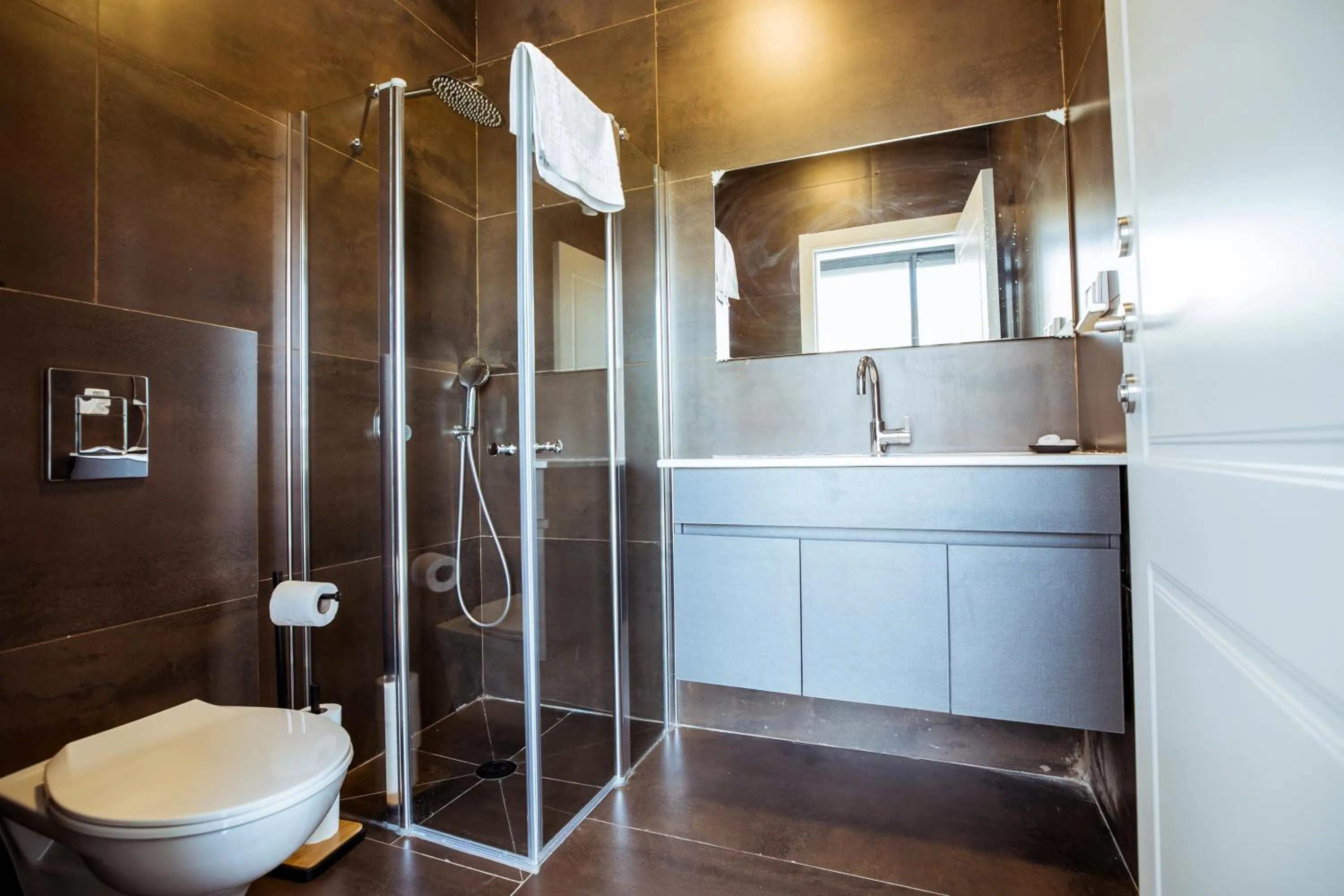 Shower in Herzl Boutique Hotel & Apartments by Domus