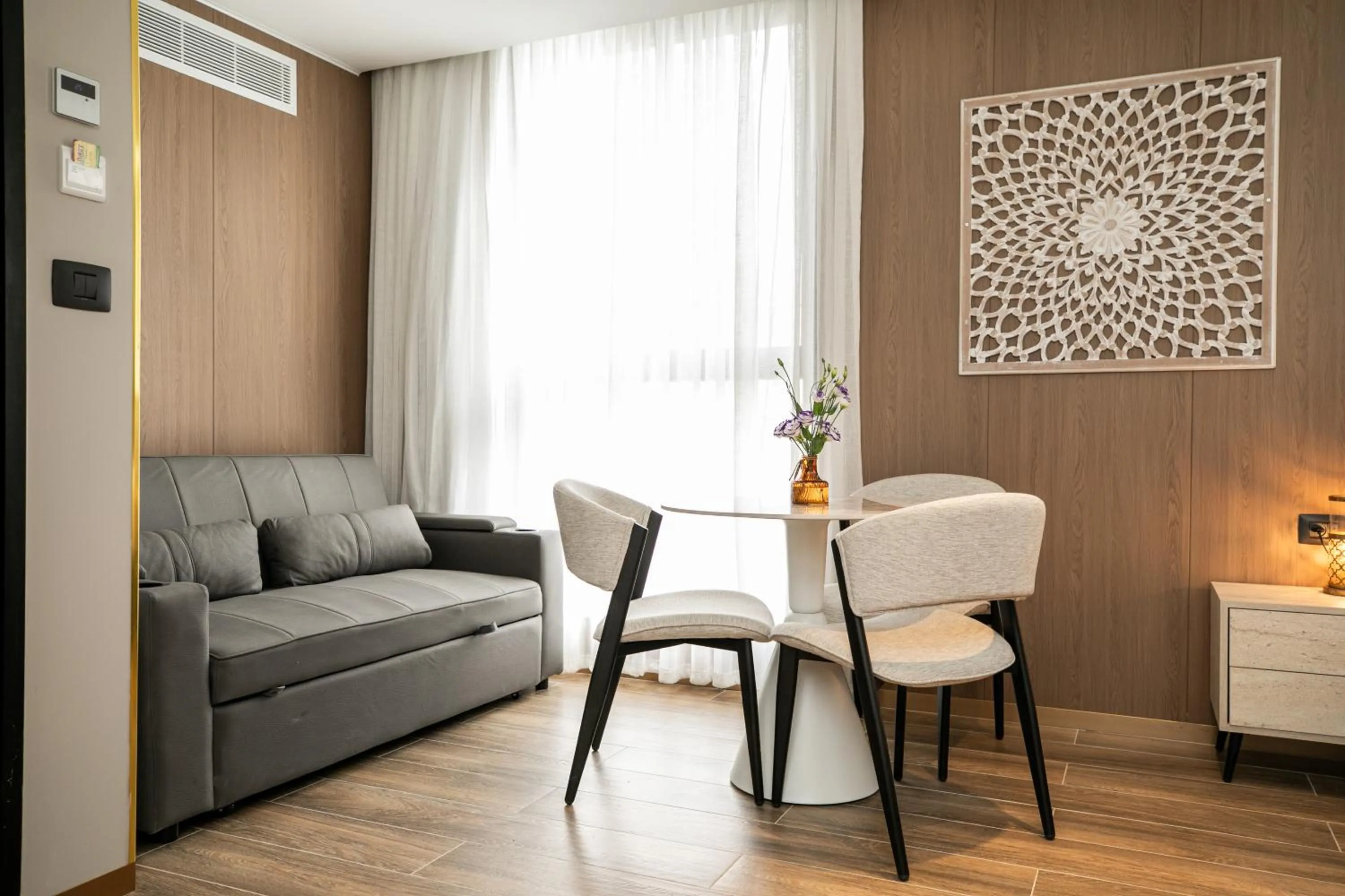Living room in Herzl Boutique Hotel & Apartments by Domus