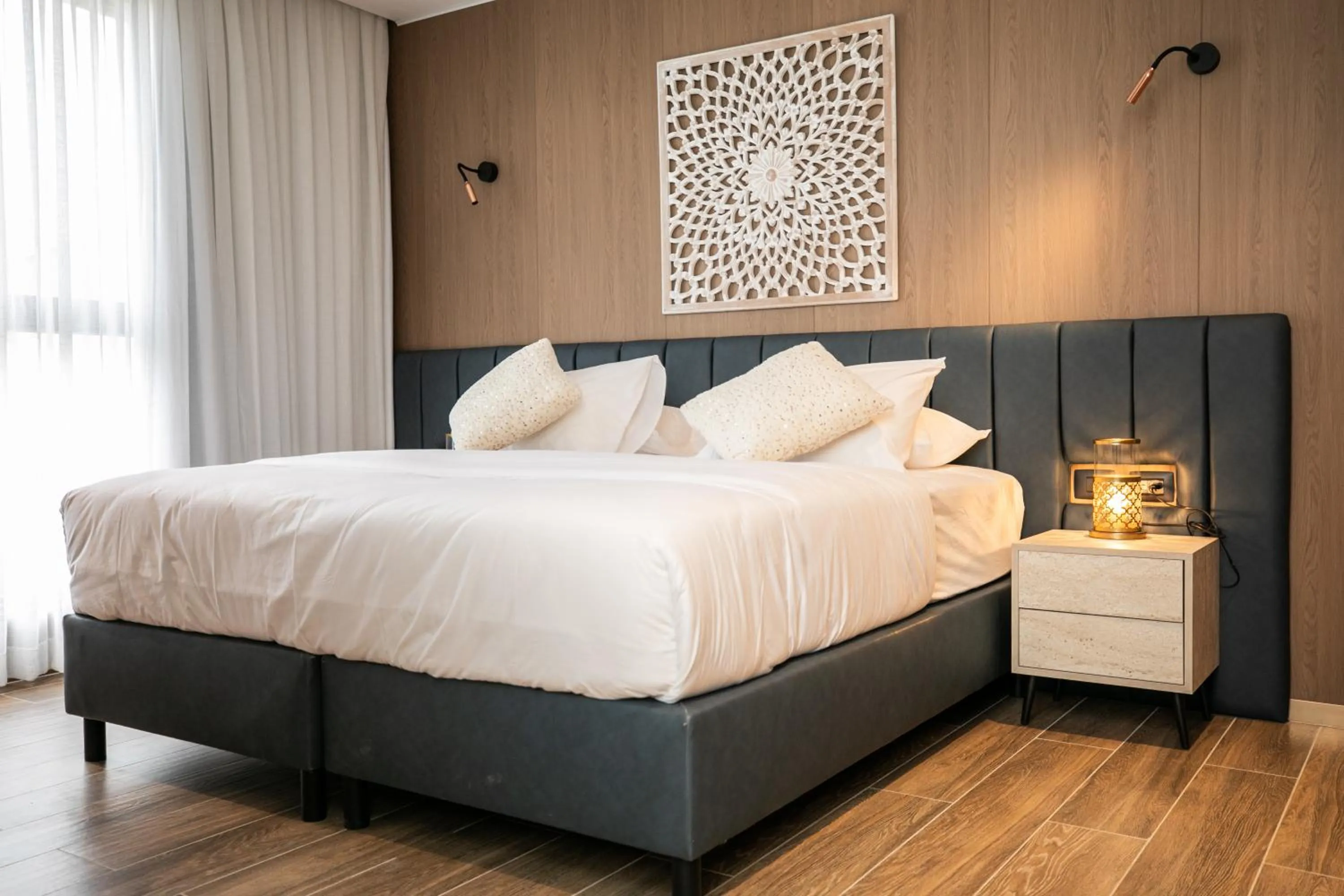 Bed in Herzl Boutique Hotel & Apartments by Domus
