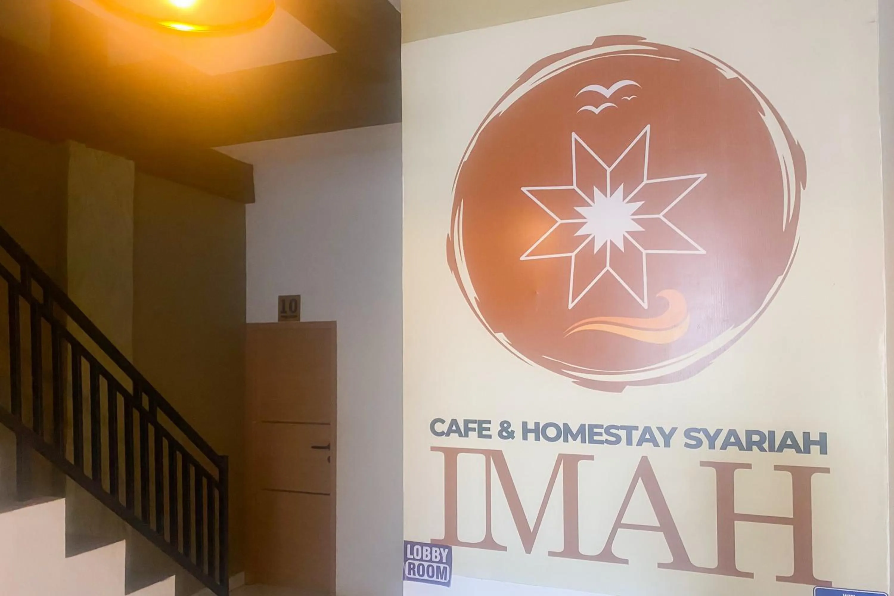 Property logo or sign in RedDoorz at Syariah Imah 2 Lampung