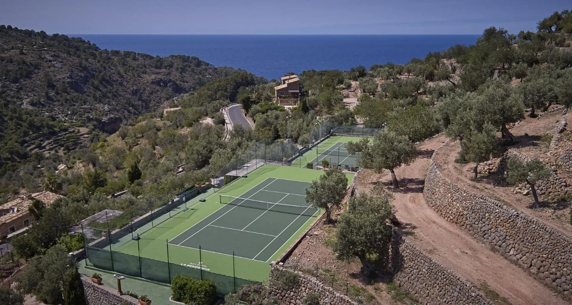 Tennis court in La Residencia, A Belmond Hotel, Mallorca