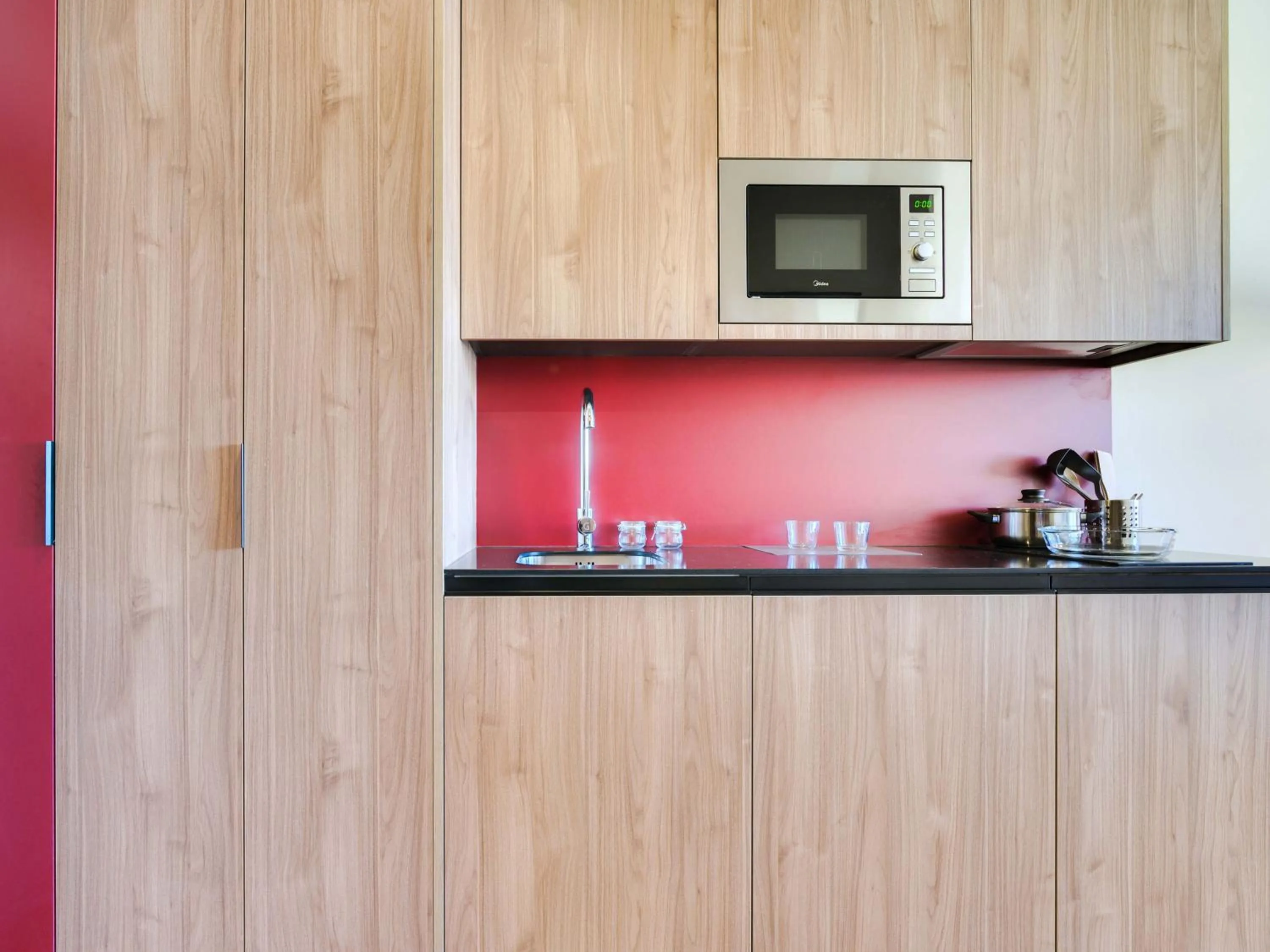 kitchen in Livensa Living Studios Madrid Alcobendas