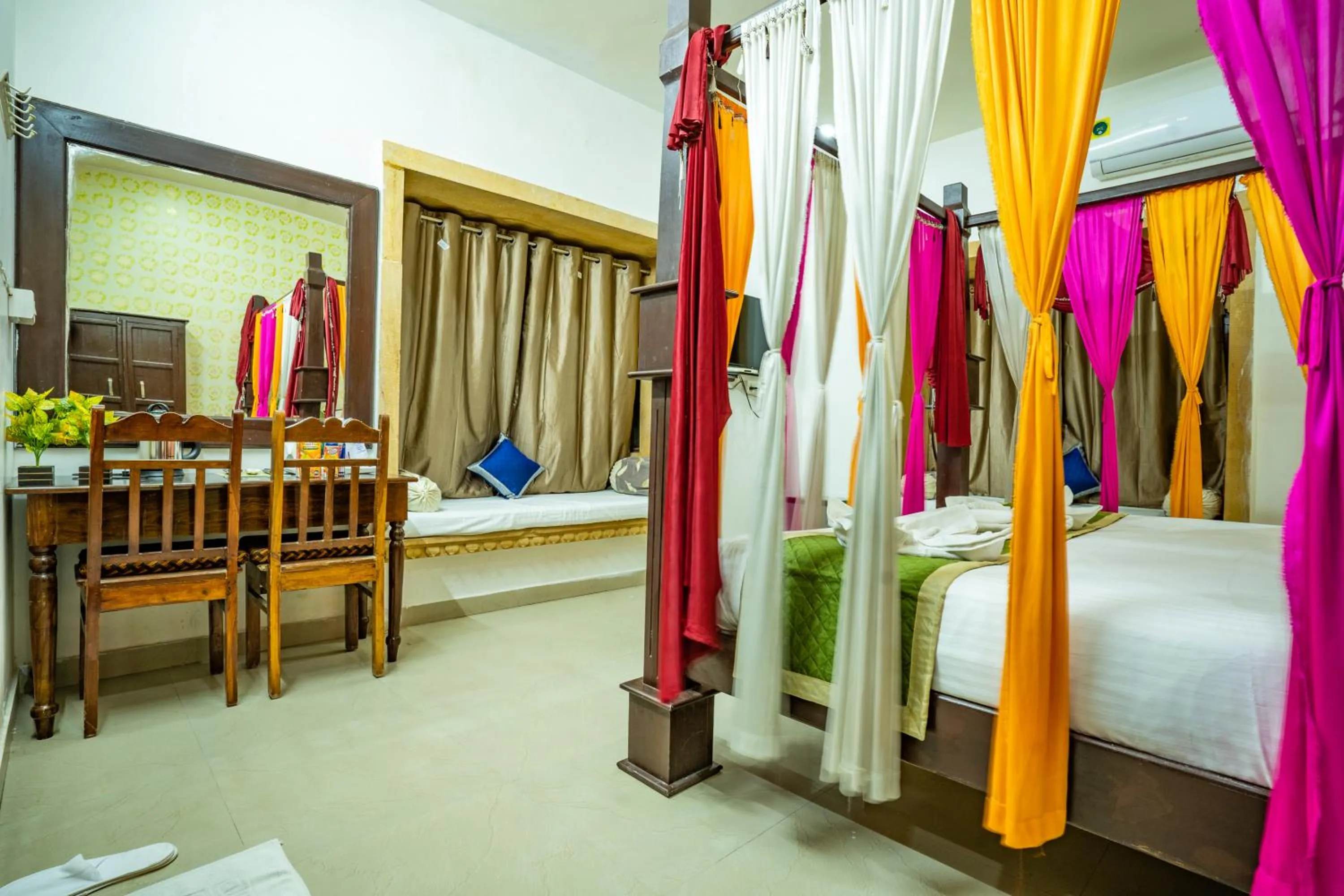 Bed in Hotel Marina Mahal with Swimming Pool