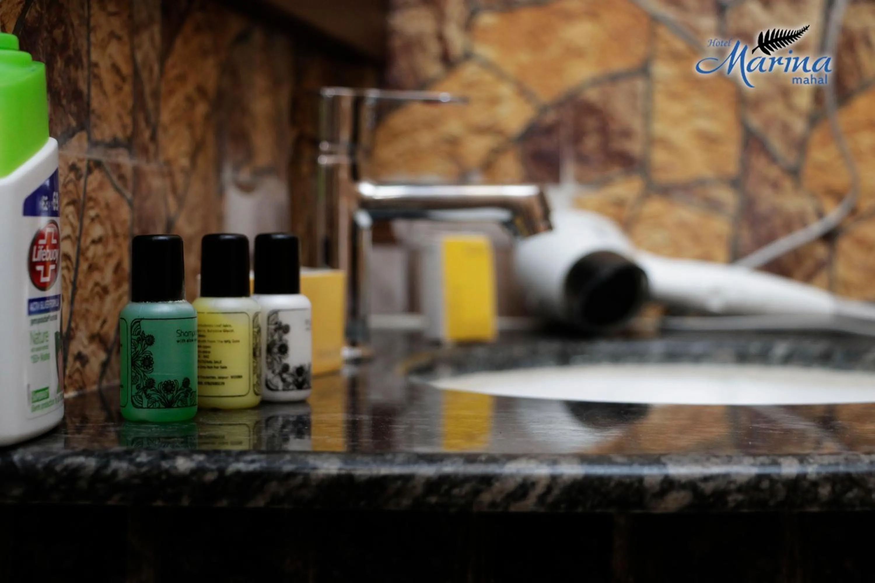 Bathroom in Hotel Marina Mahal with Swimming Pool