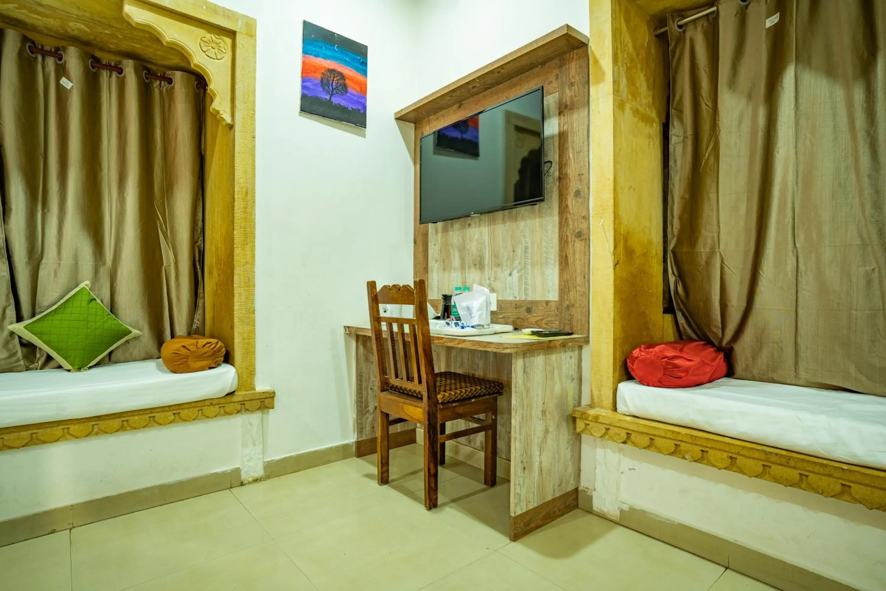 Bed in Hotel Marina Mahal with Swimming Pool