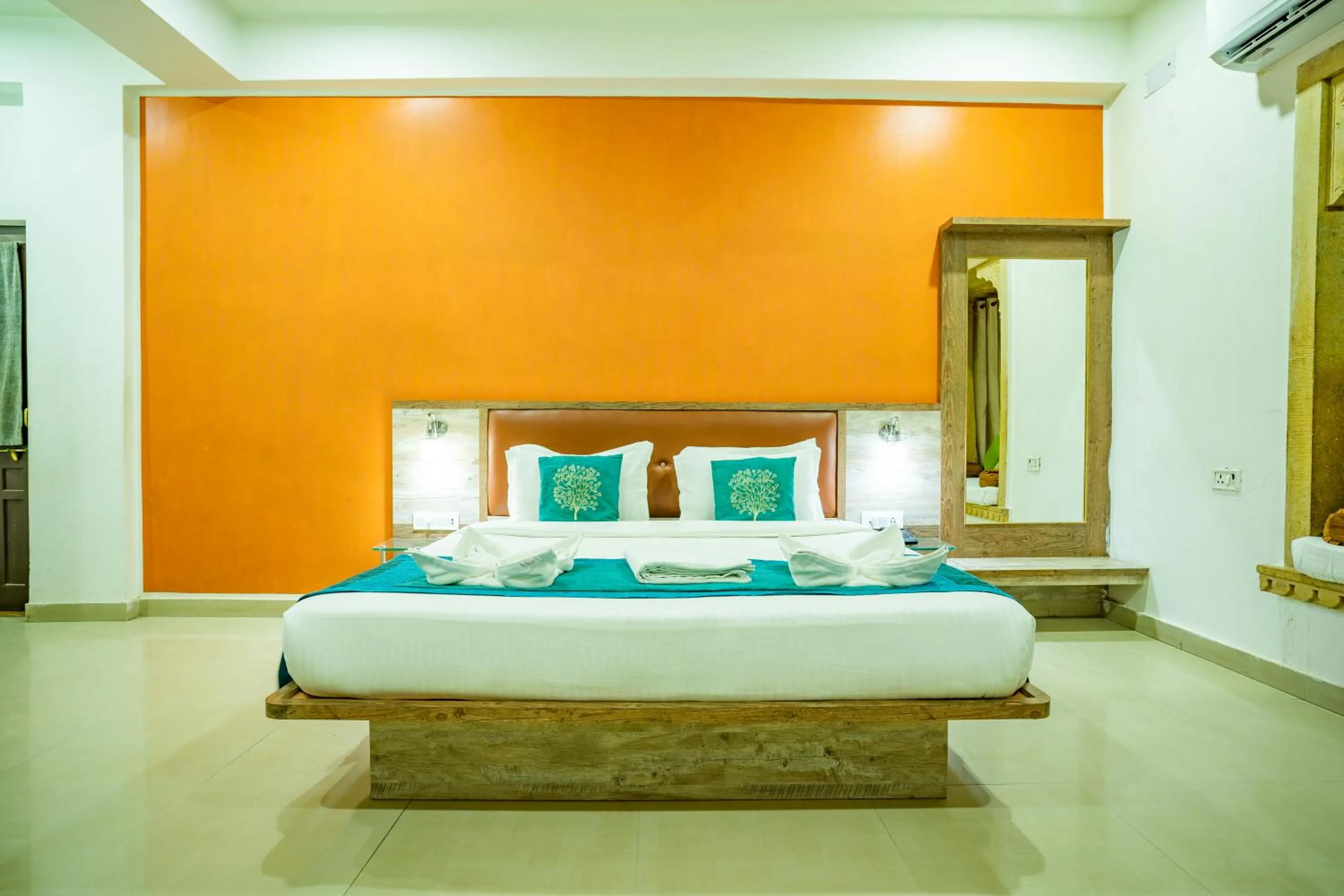 Bed in Hotel Marina Mahal with Swimming Pool