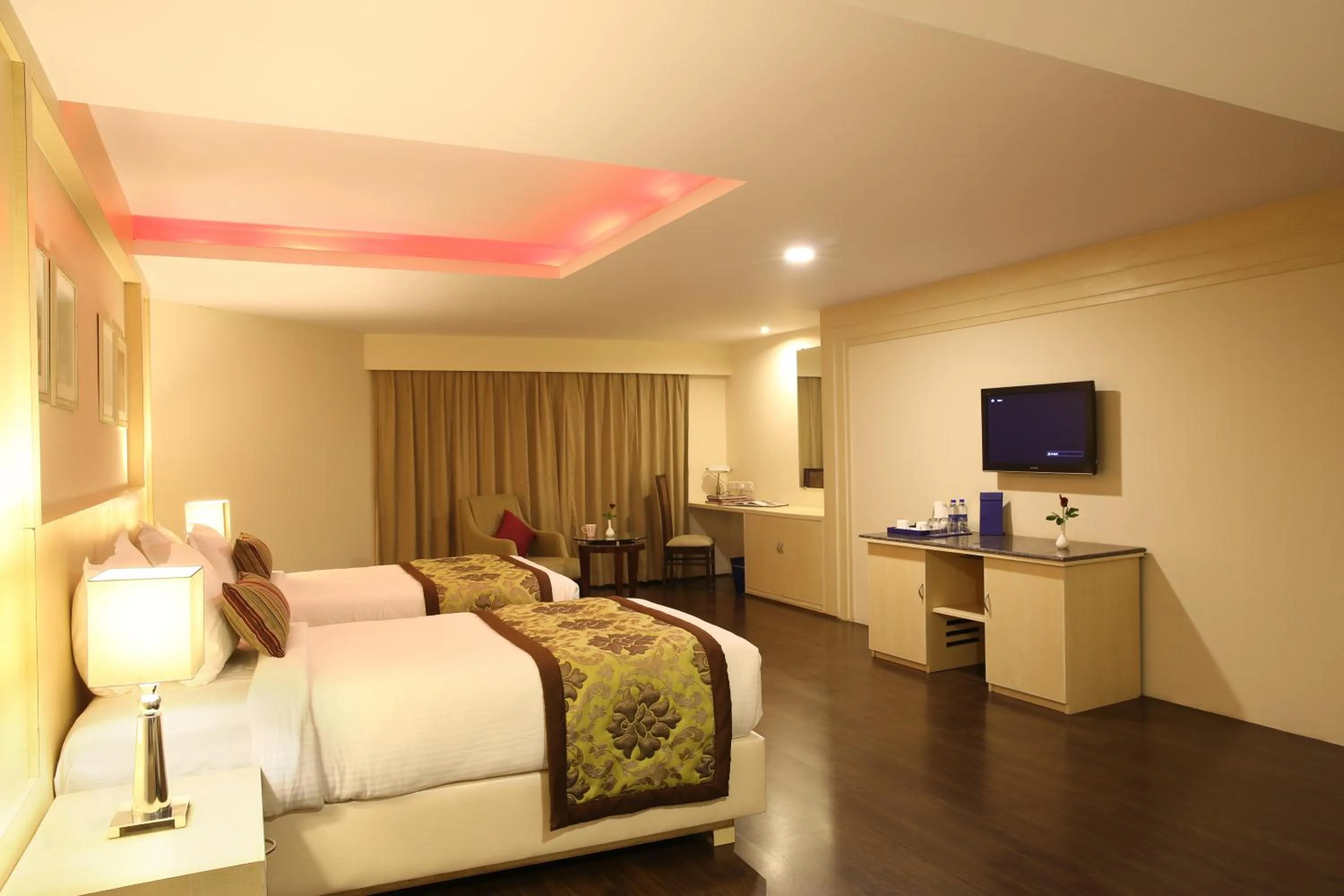 Photo of the whole room, Bed in Golden Tulip Jaipur City Center