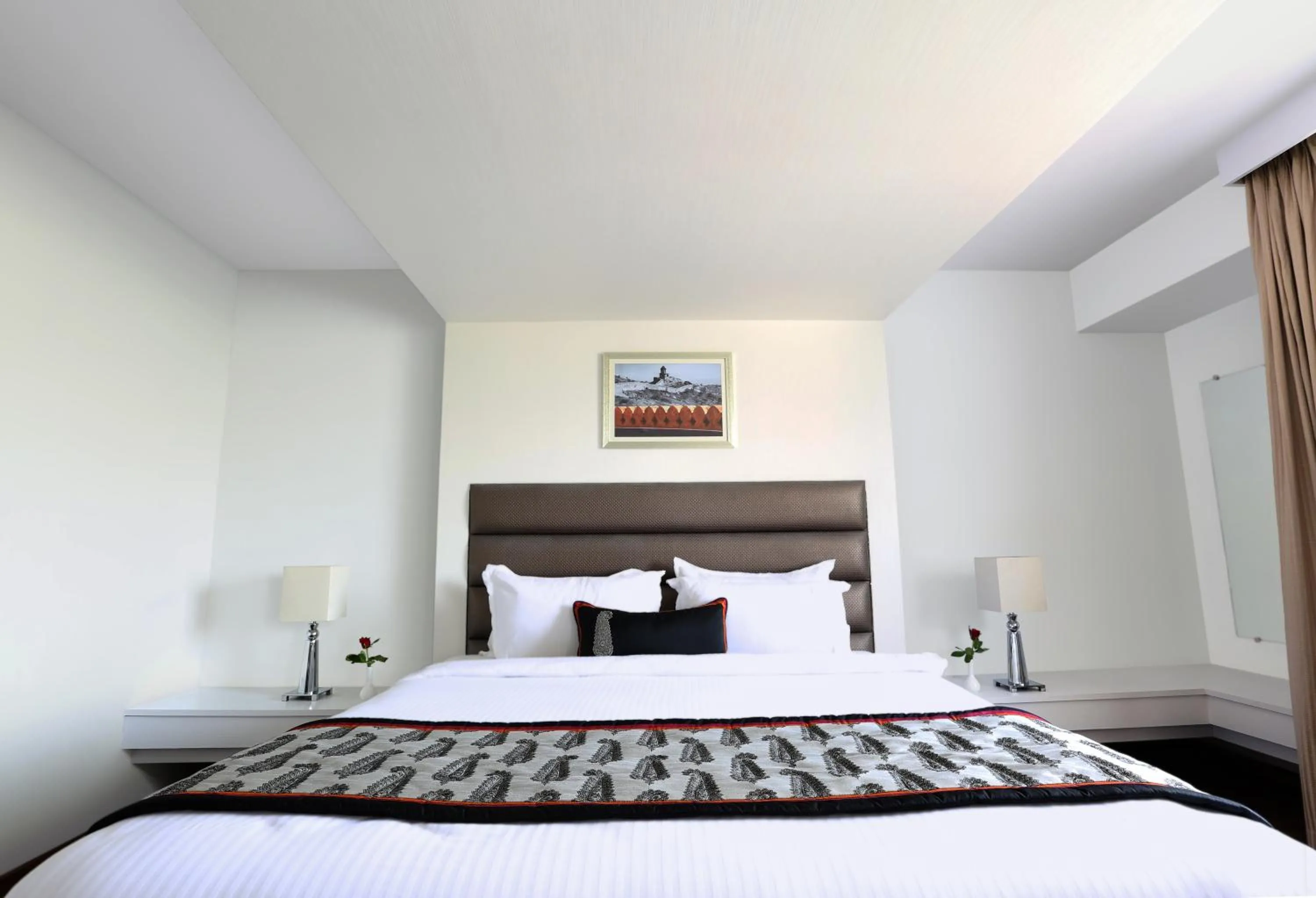 Photo of the whole room, Bed in Golden Tulip Jaipur City Center