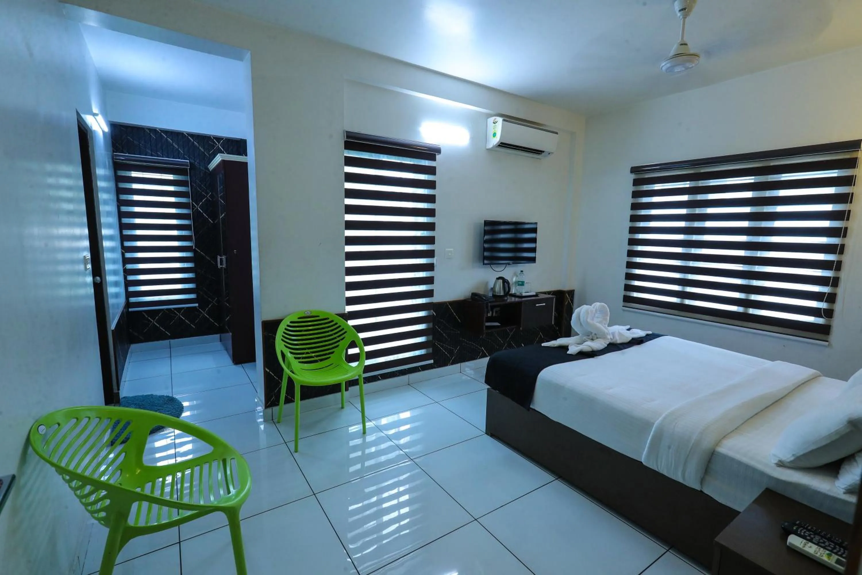 Bed in D-Green Hotels