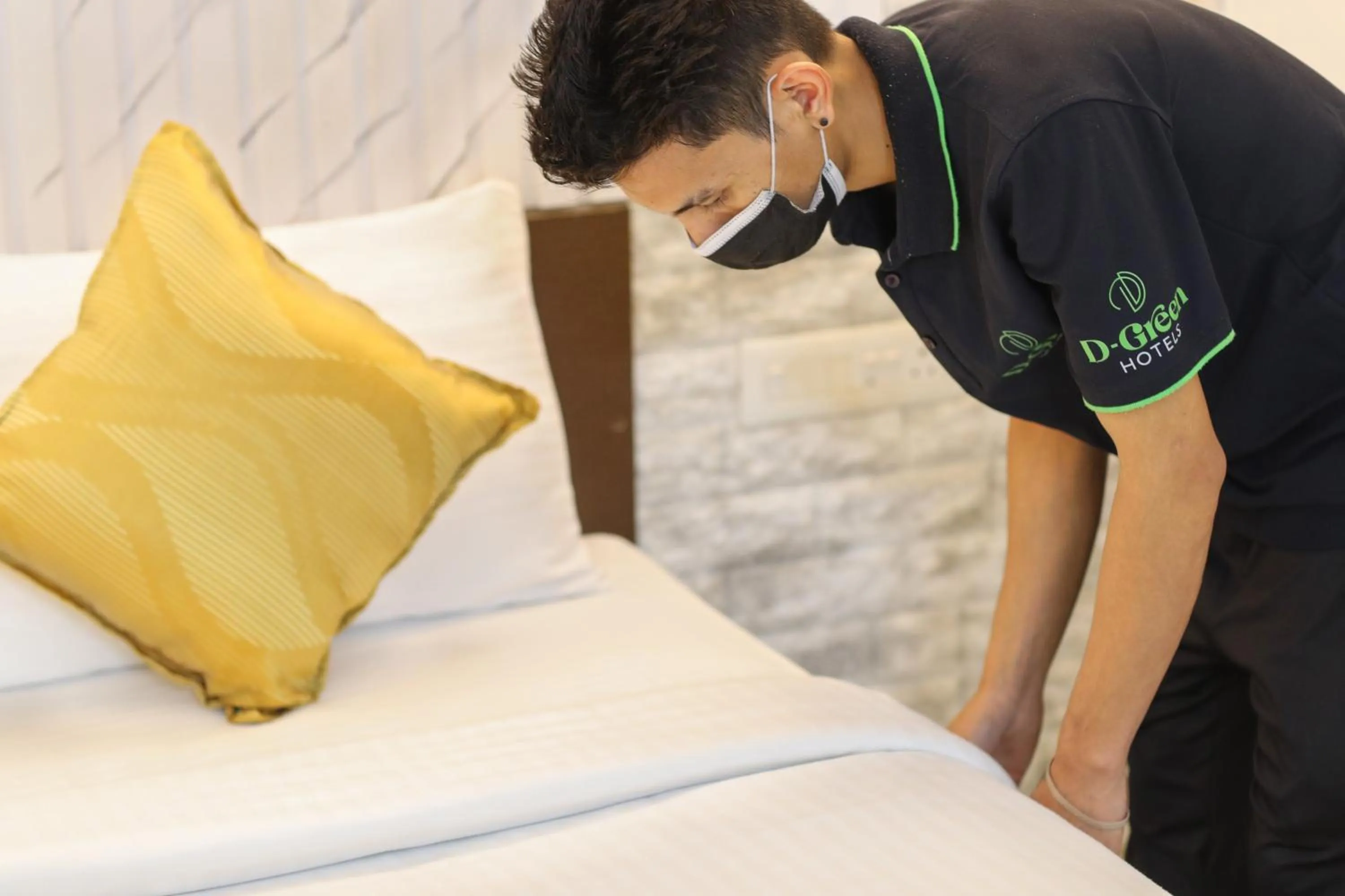 Bed in D-Green Hotels