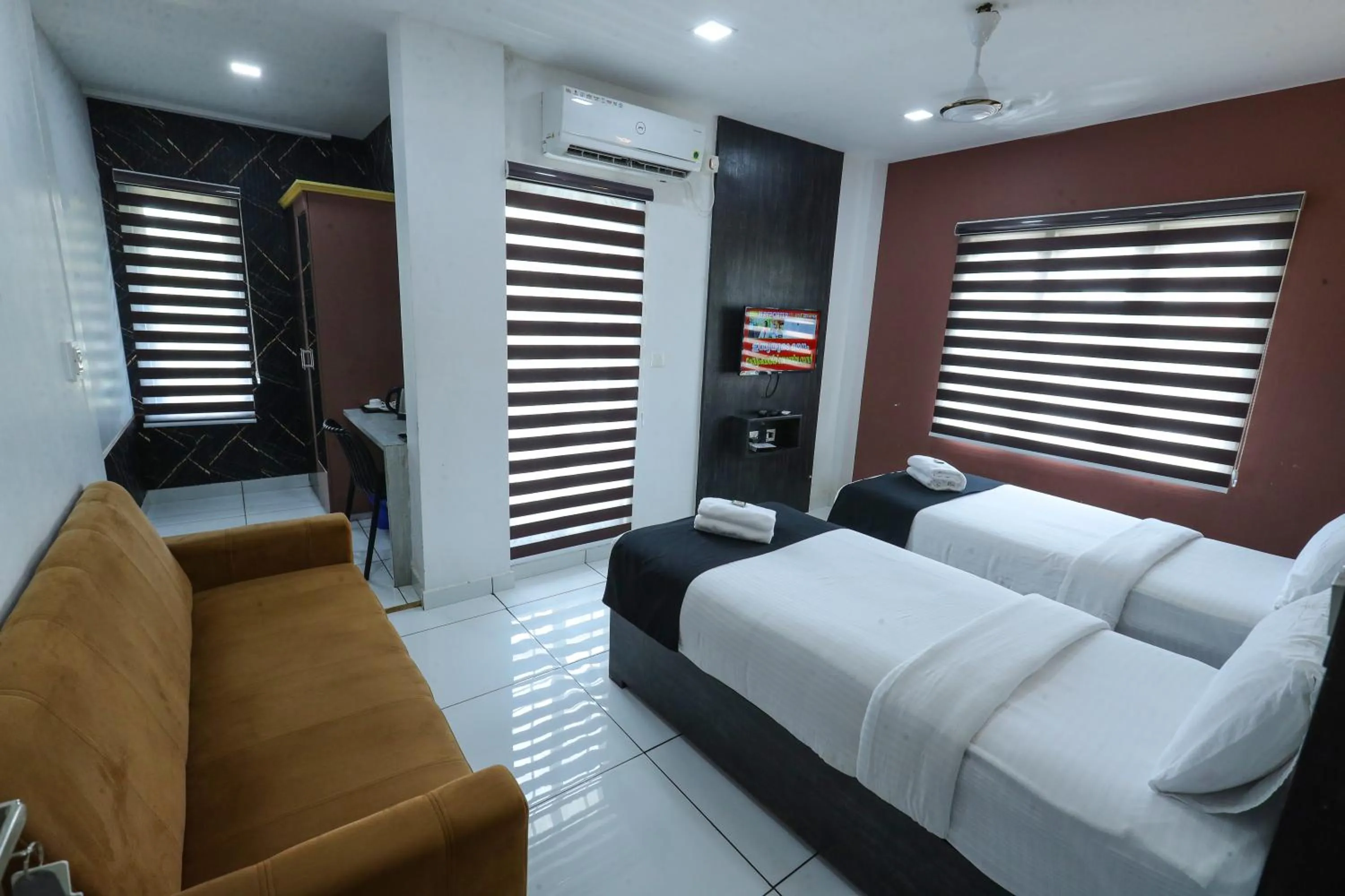 Bed in D-Green Hotels