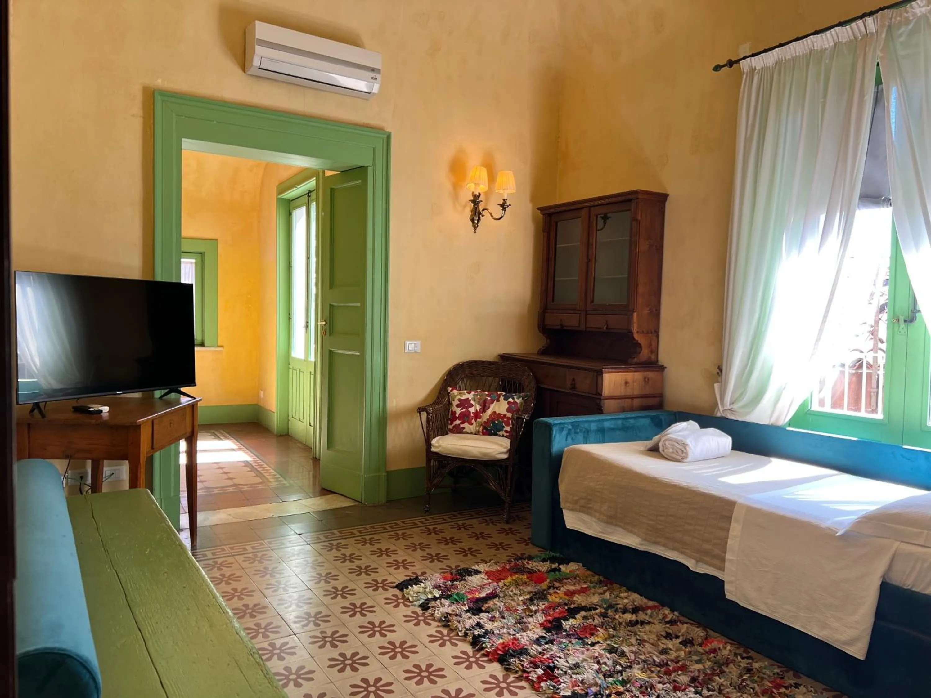 Living room, Bed in Casa D'aria