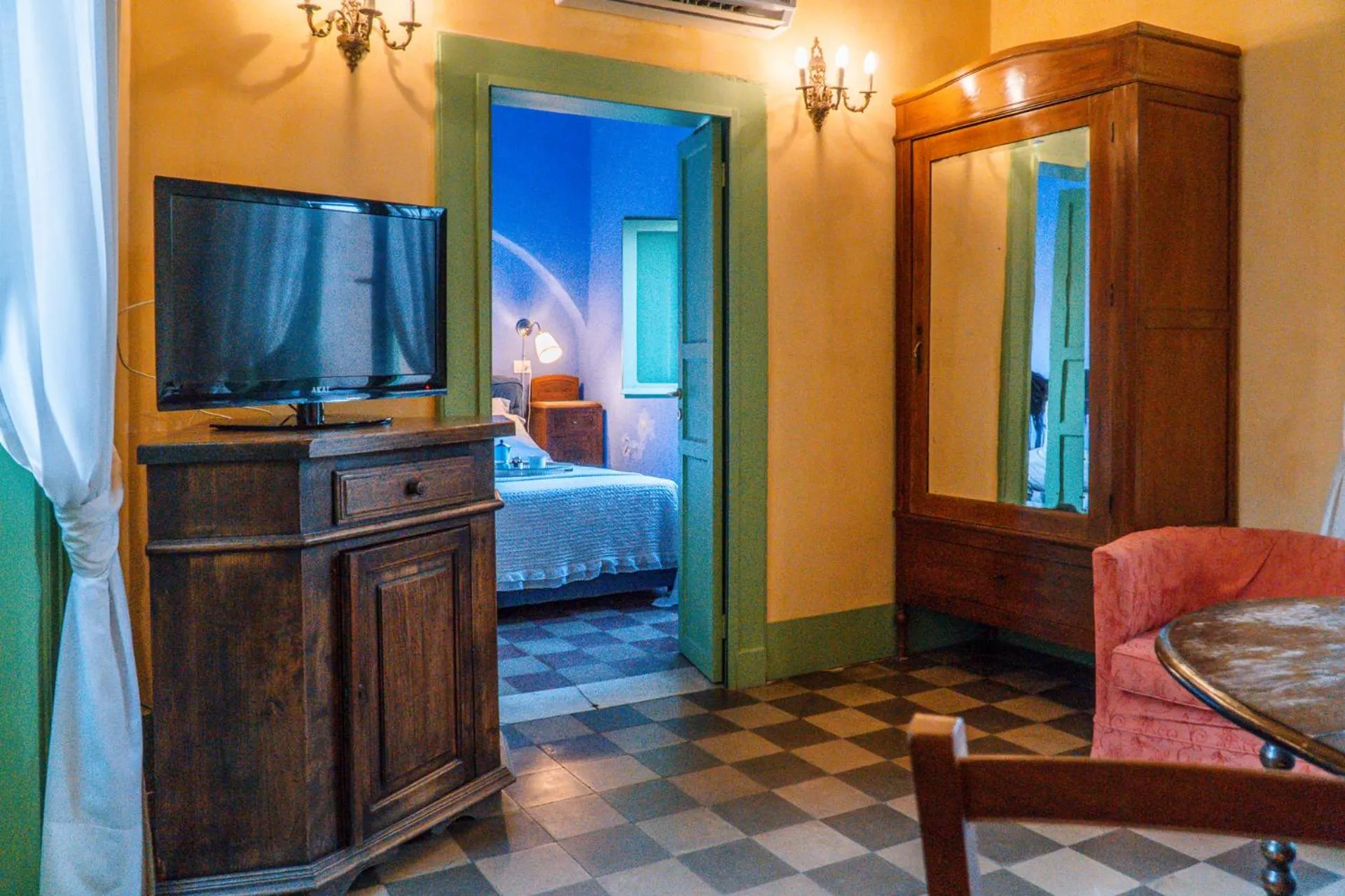 Seating area, Bed in Casa D'aria