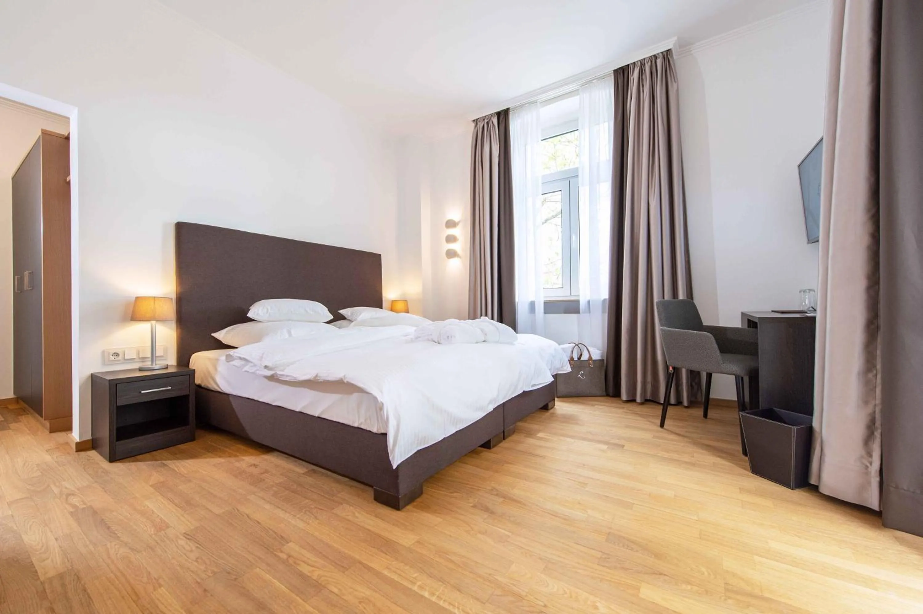 Photo of the whole room, Bed in Laudensacks Parkhotel & Retreat