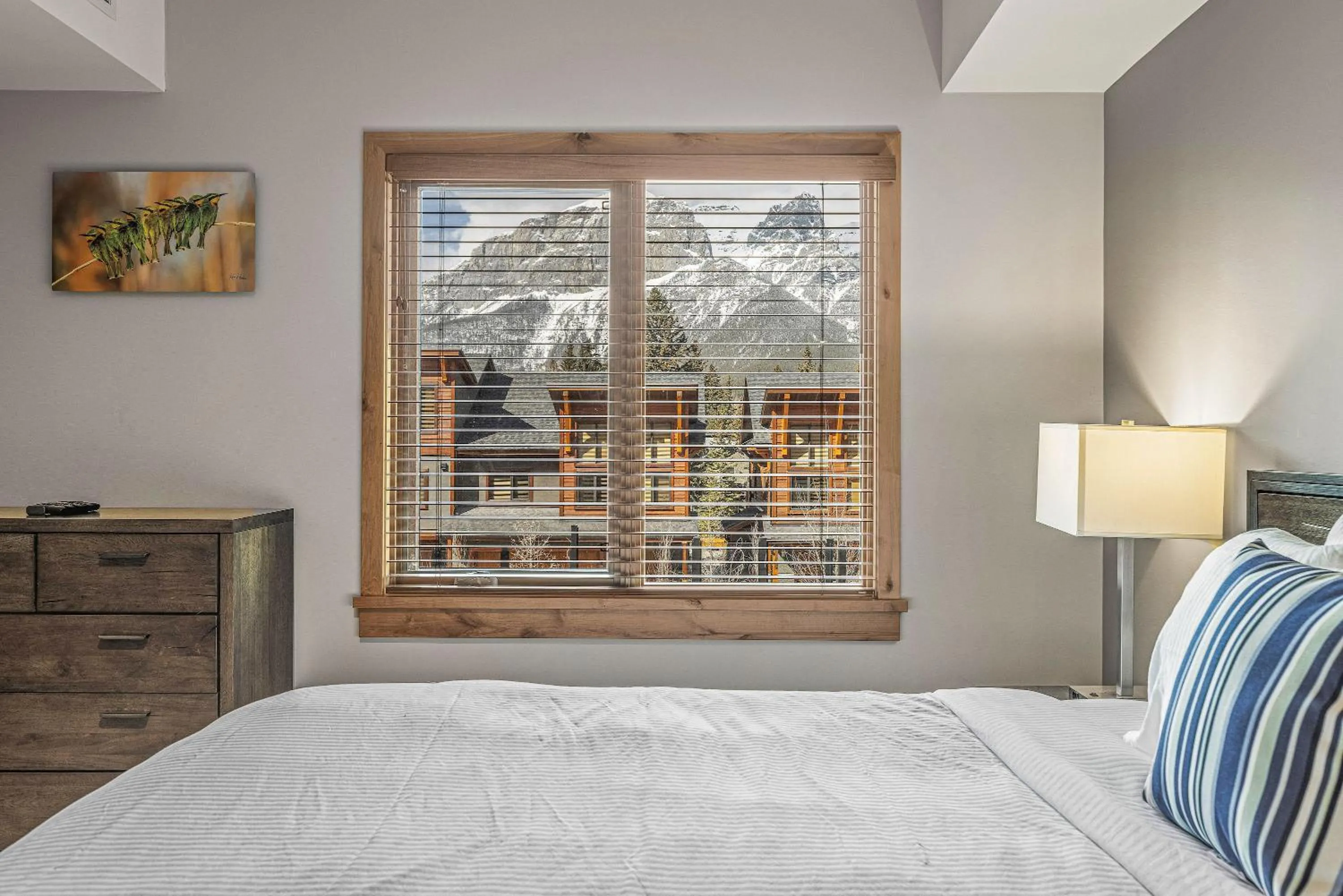 Bed in Spring Creek Condo by Canadian Rockies Vacation Rentals