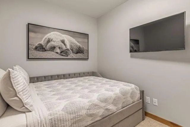 Bed in Spring Creek Condo by Canadian Rockies Vacation Rentals
