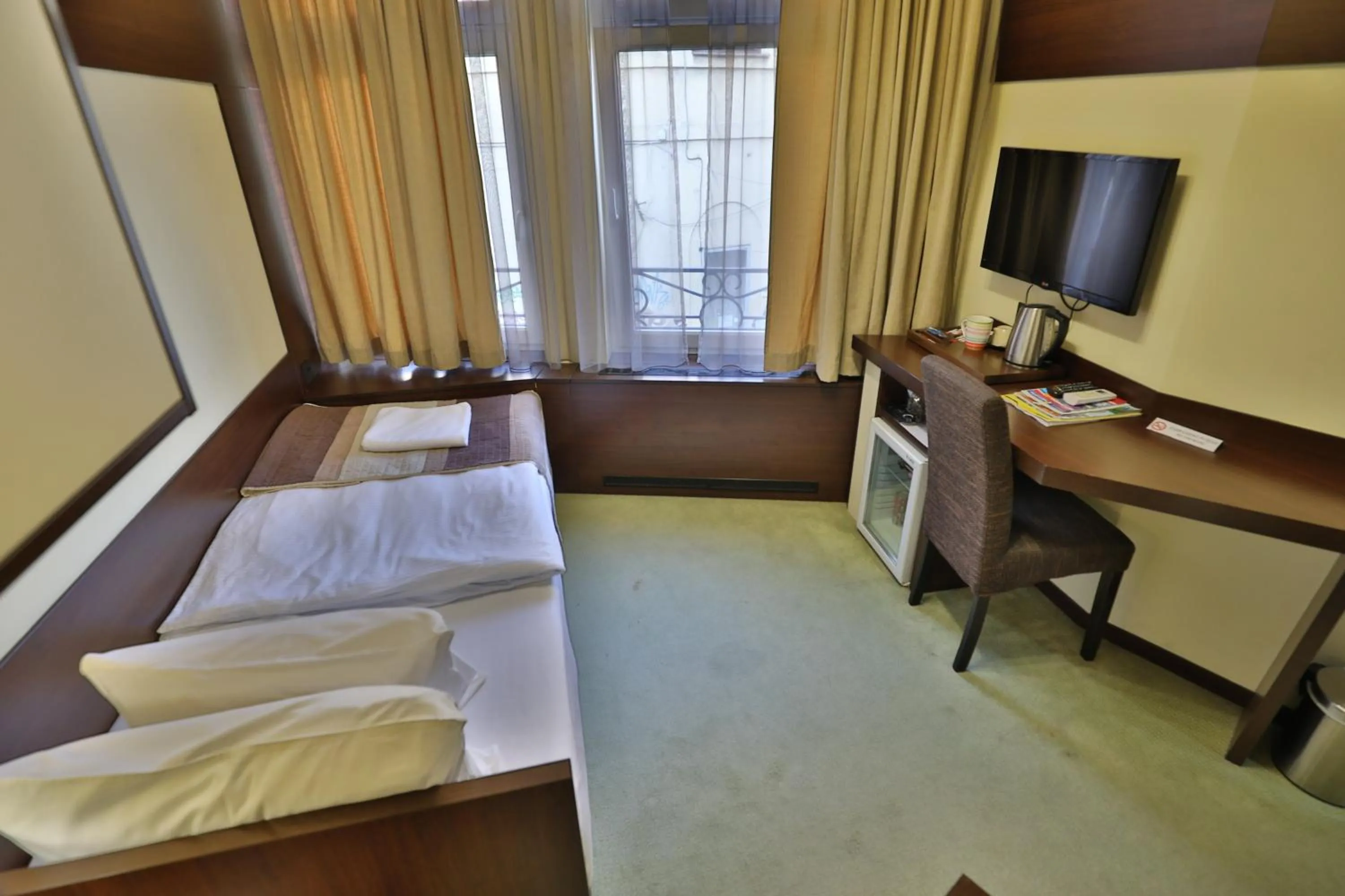 Photo of the whole room, Bed in Boutique Hotel Golden Star
