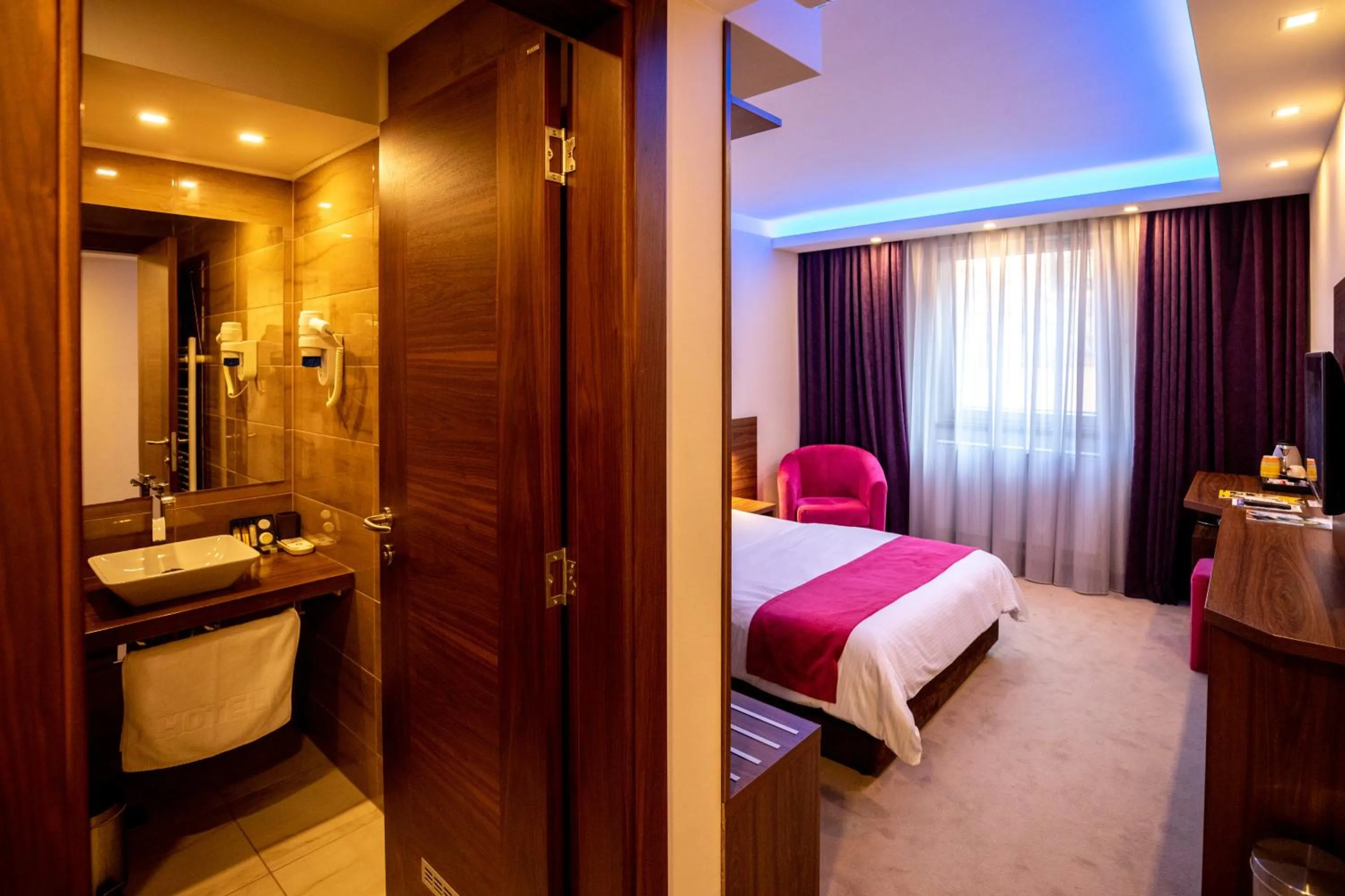 Photo of the whole room, Bed in Boutique Hotel Golden Star