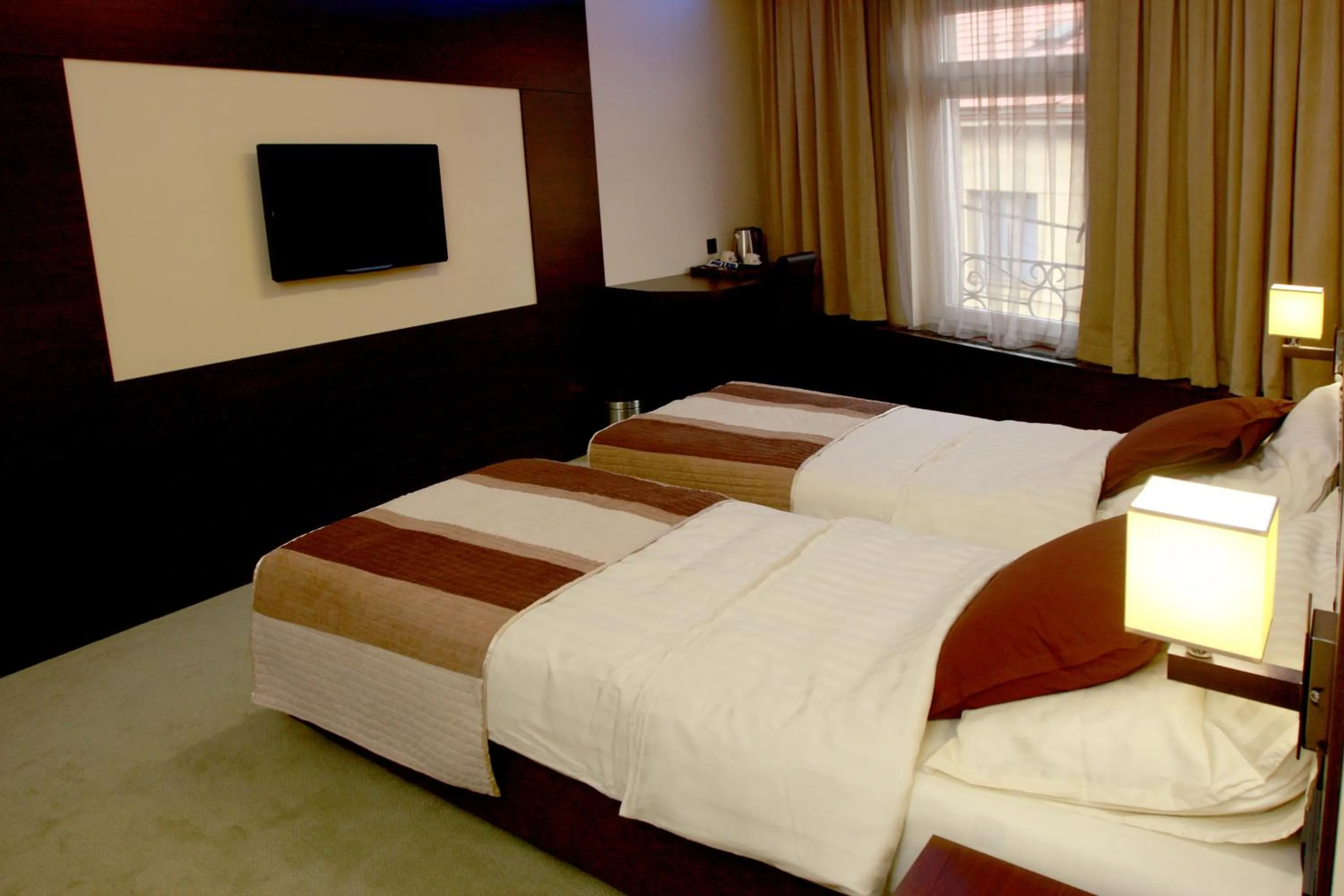 Bed in Boutique Hotel Golden Star