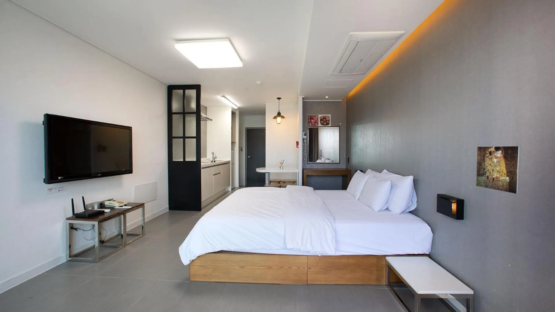 Bed in Carib Condo Hotel