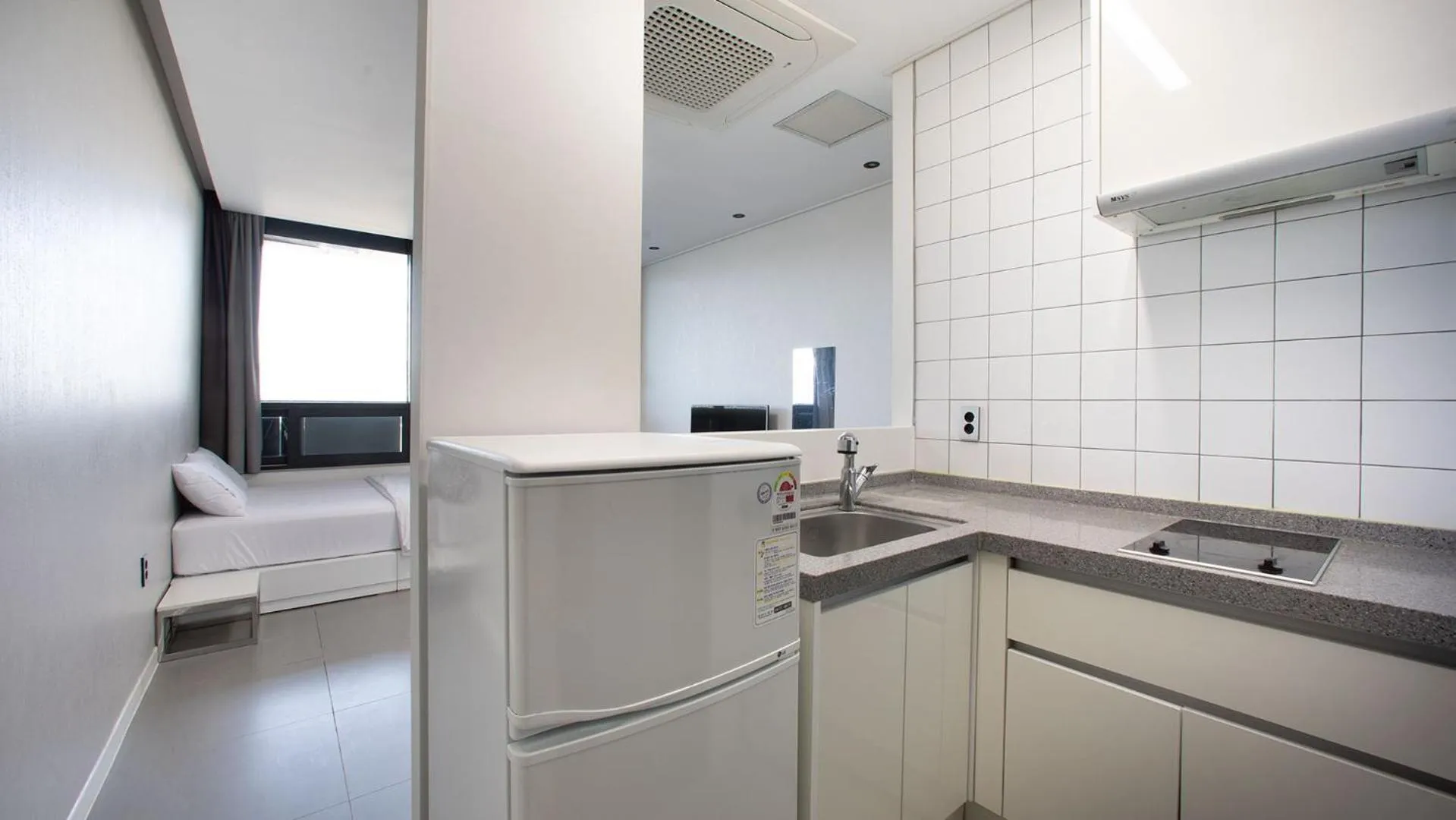 Kitchen or kitchenette in Carib Condo Hotel