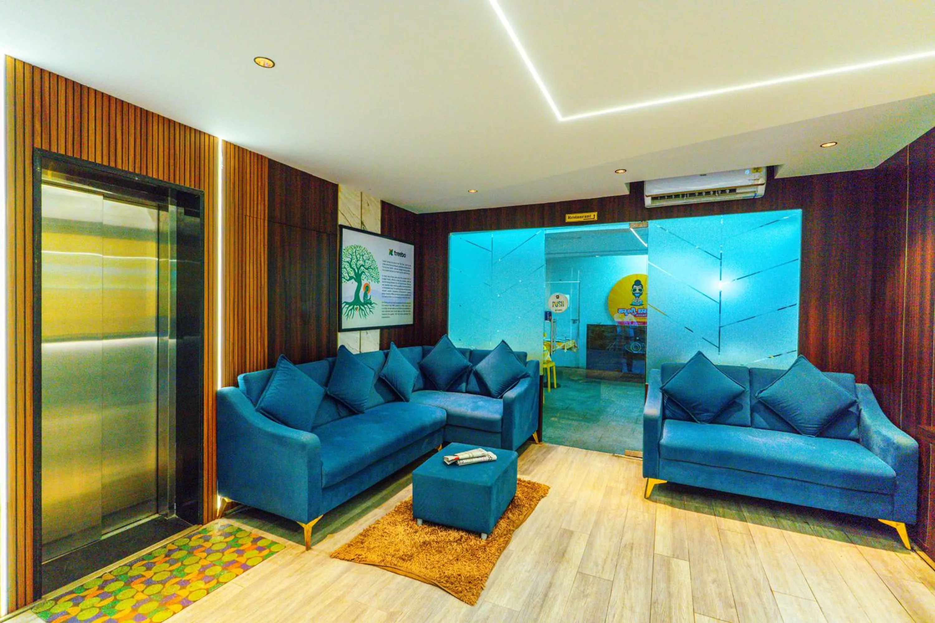 Seating area in Treebo Elmas Grand