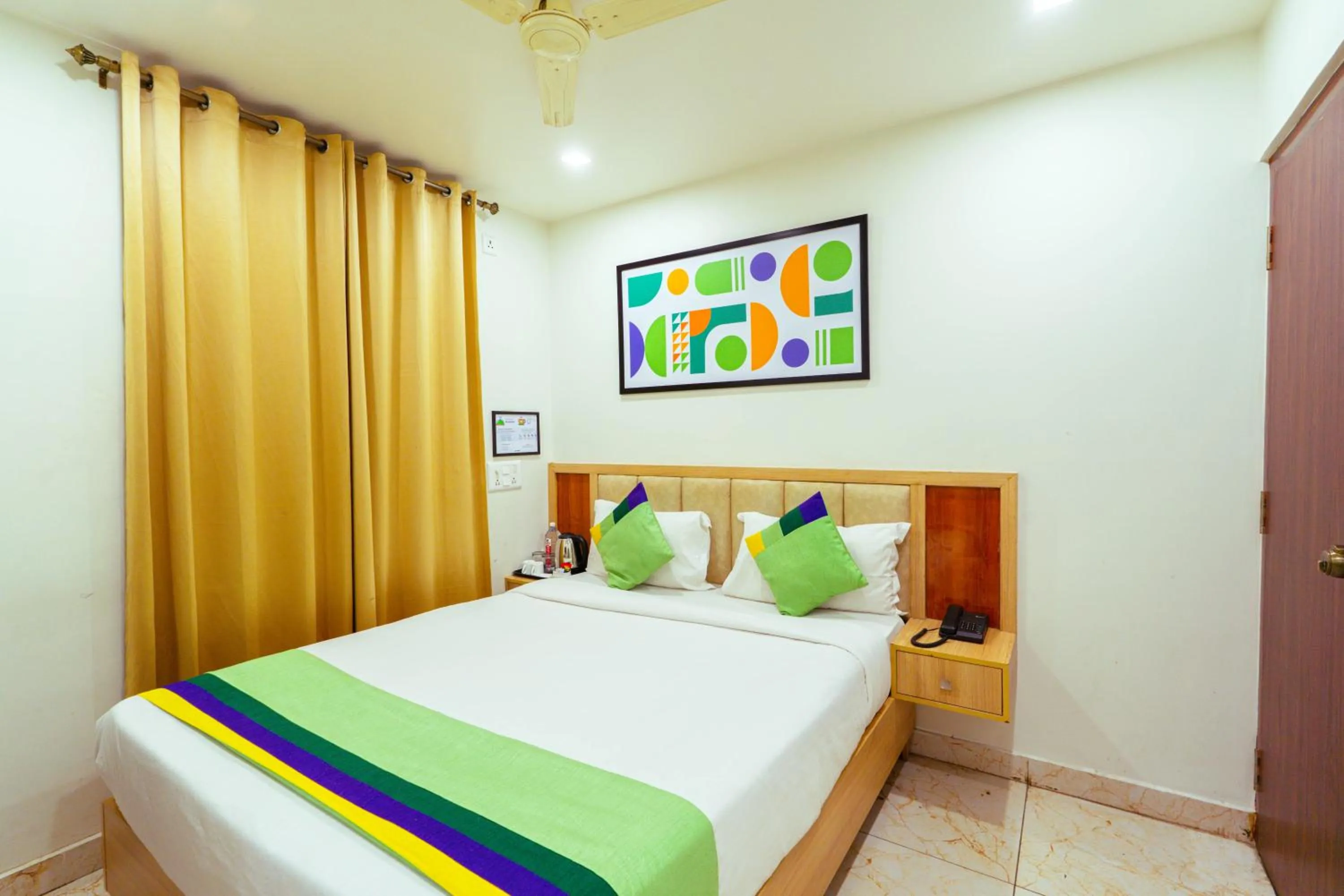 Bedroom, Bed in Treebo Elmas Grand