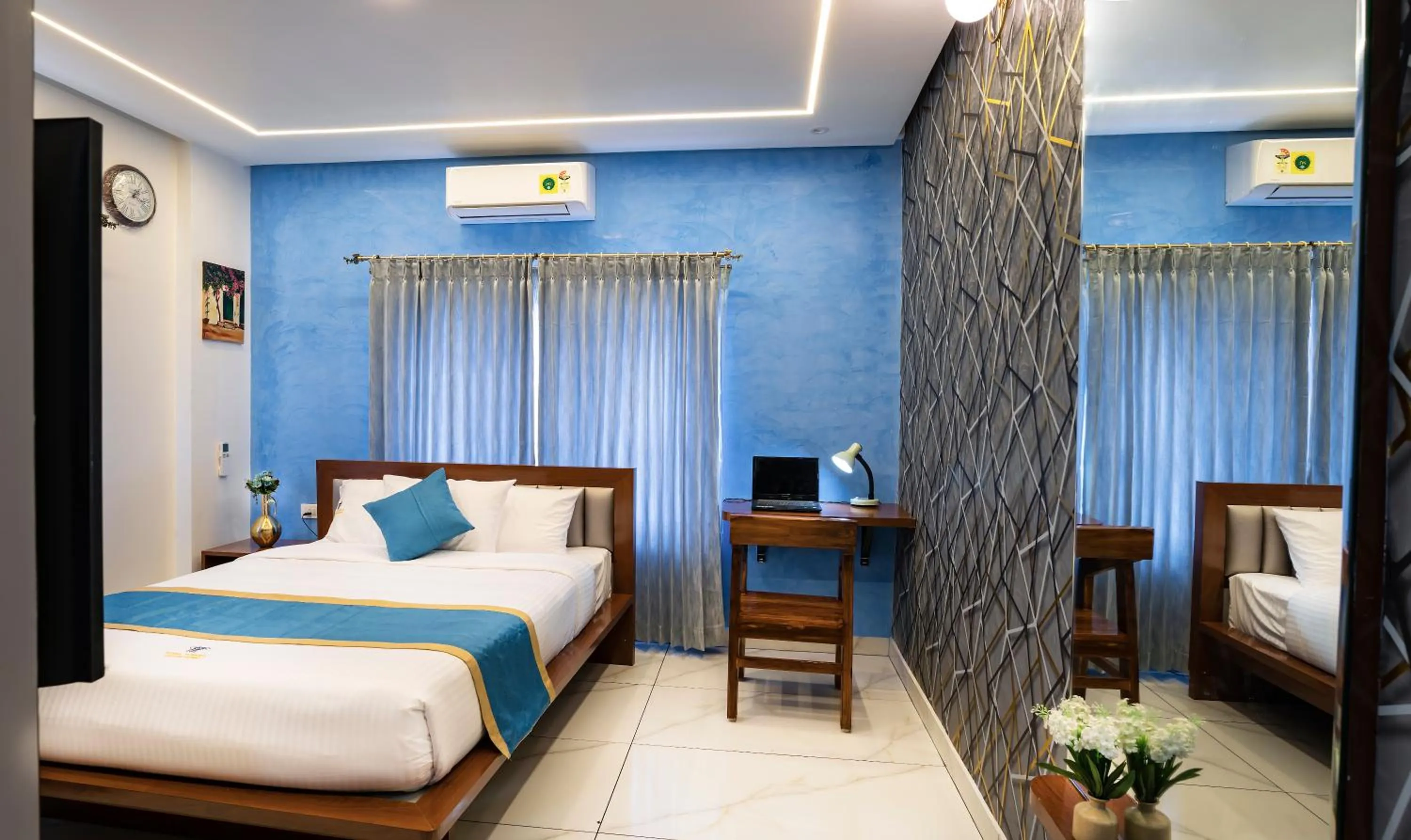 Bed in Royal Tusker Luxury Service Apartments
