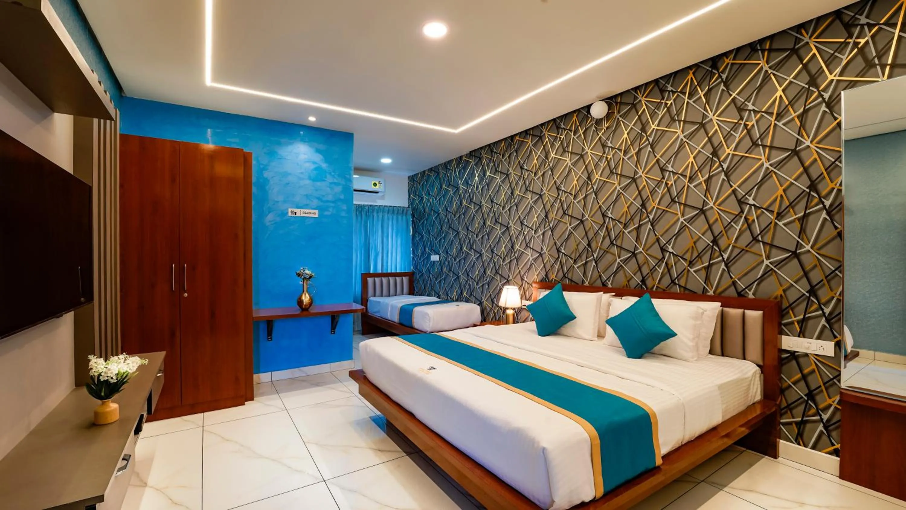 Bed in Royal Tusker Luxury Service Apartments
