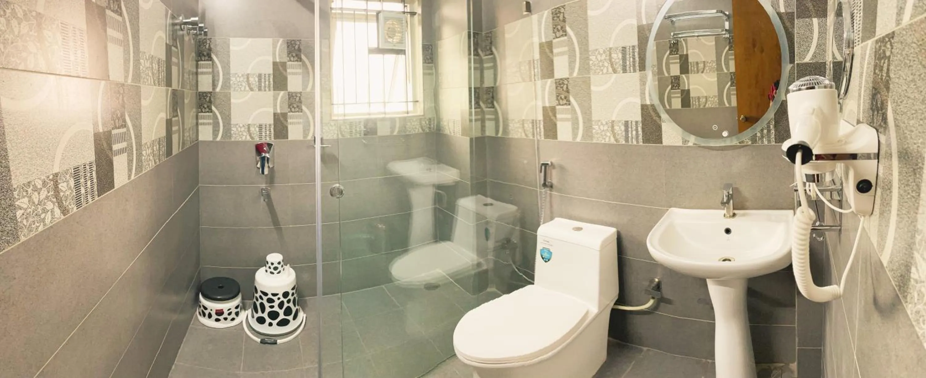 Shower in Royal Tusker Luxury Service Apartments