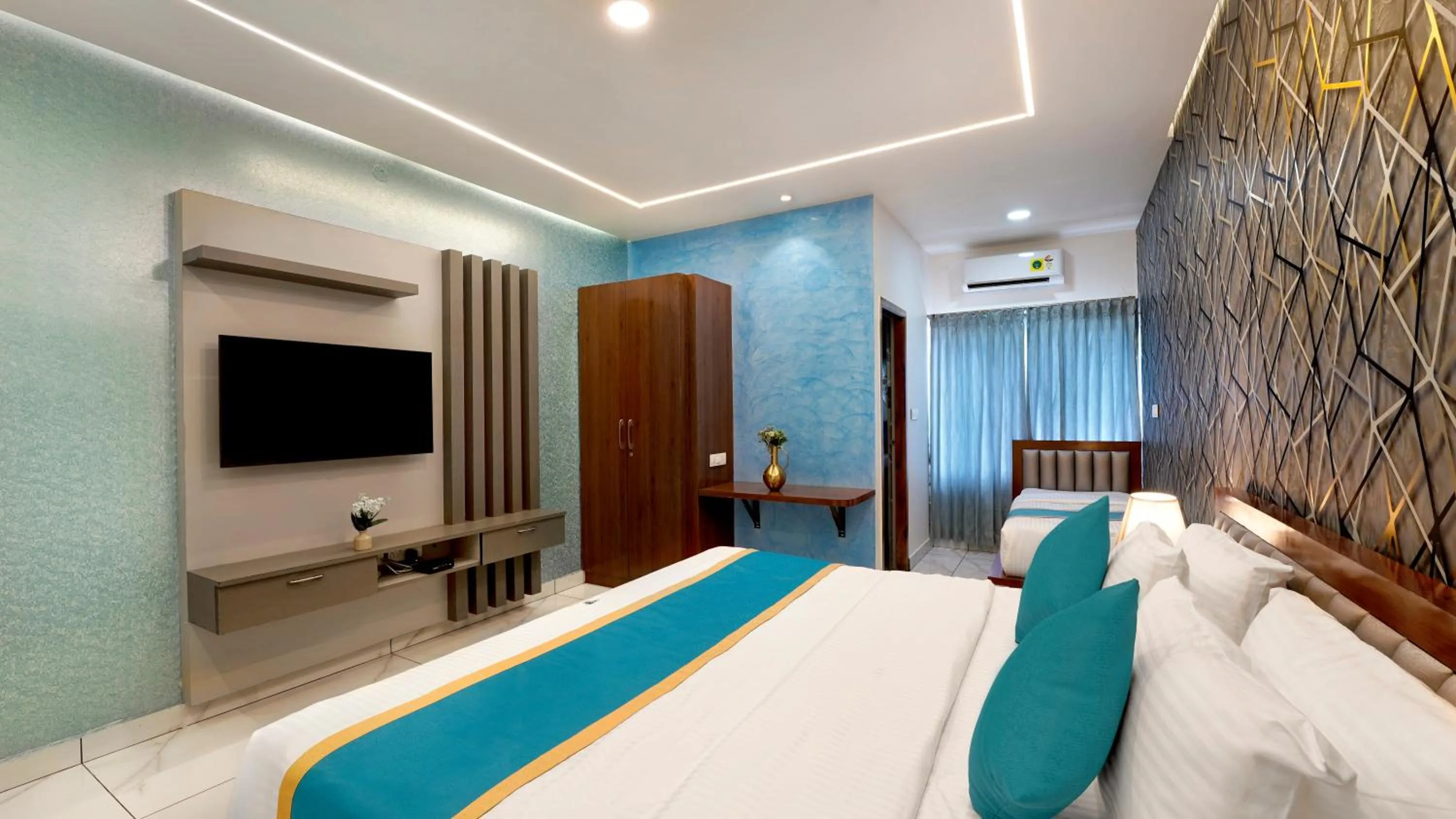 Bed in Royal Tusker Luxury Service Apartments