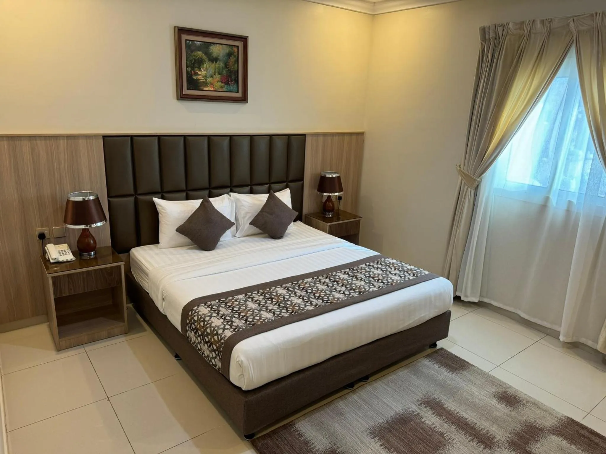 Photo of the whole room, Bed in PRIMOTEL Suites As Salamah