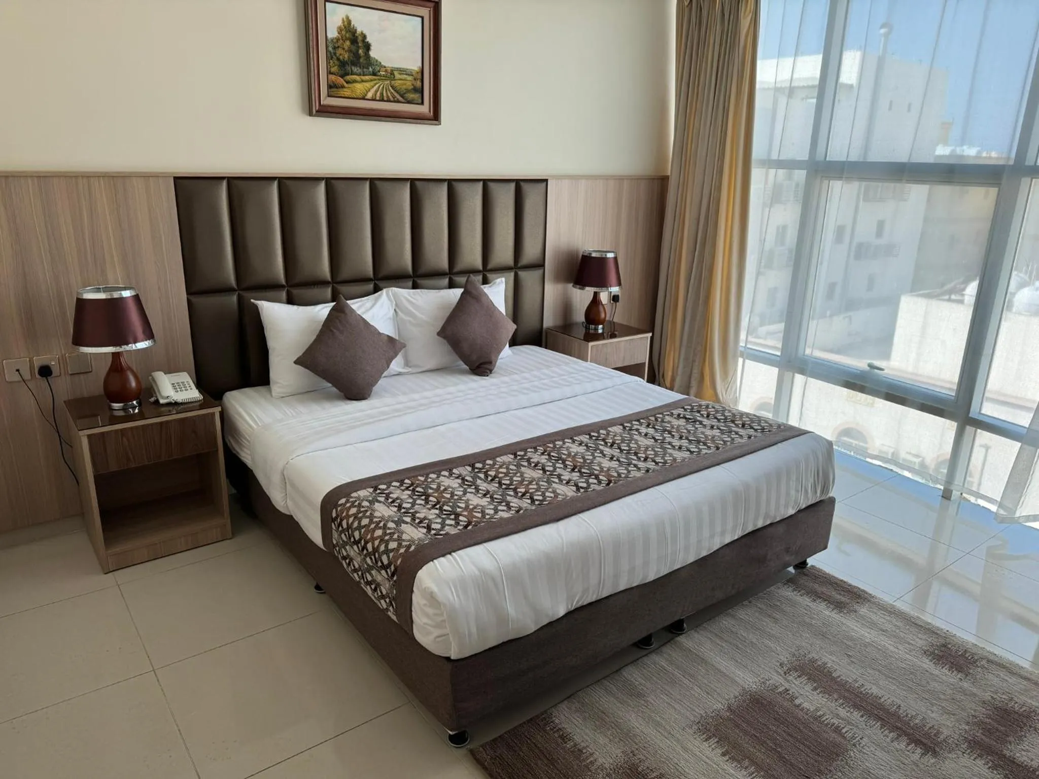 Photo of the whole room, Bed in PRIMOTEL Suites As Salamah
