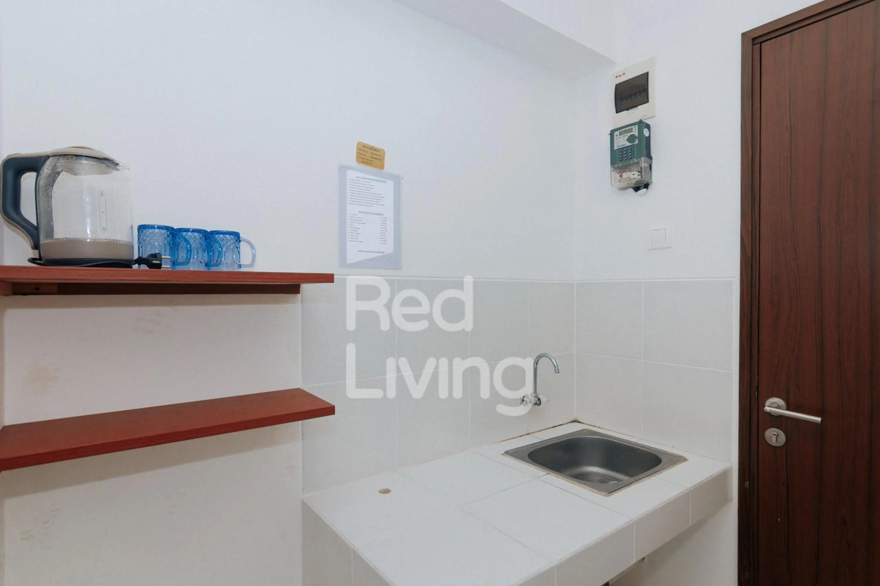 Kitchen or kitchenette in RedLiving Apartemen Gunung Putri Square - TOP Room