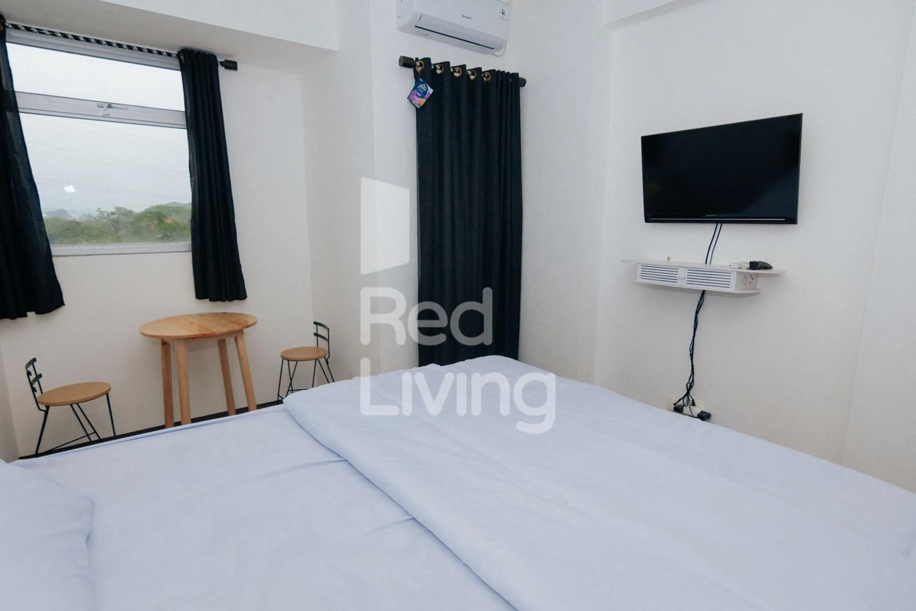 Bedroom in RedLiving Apartemen Gunung Putri Square - TOP Room