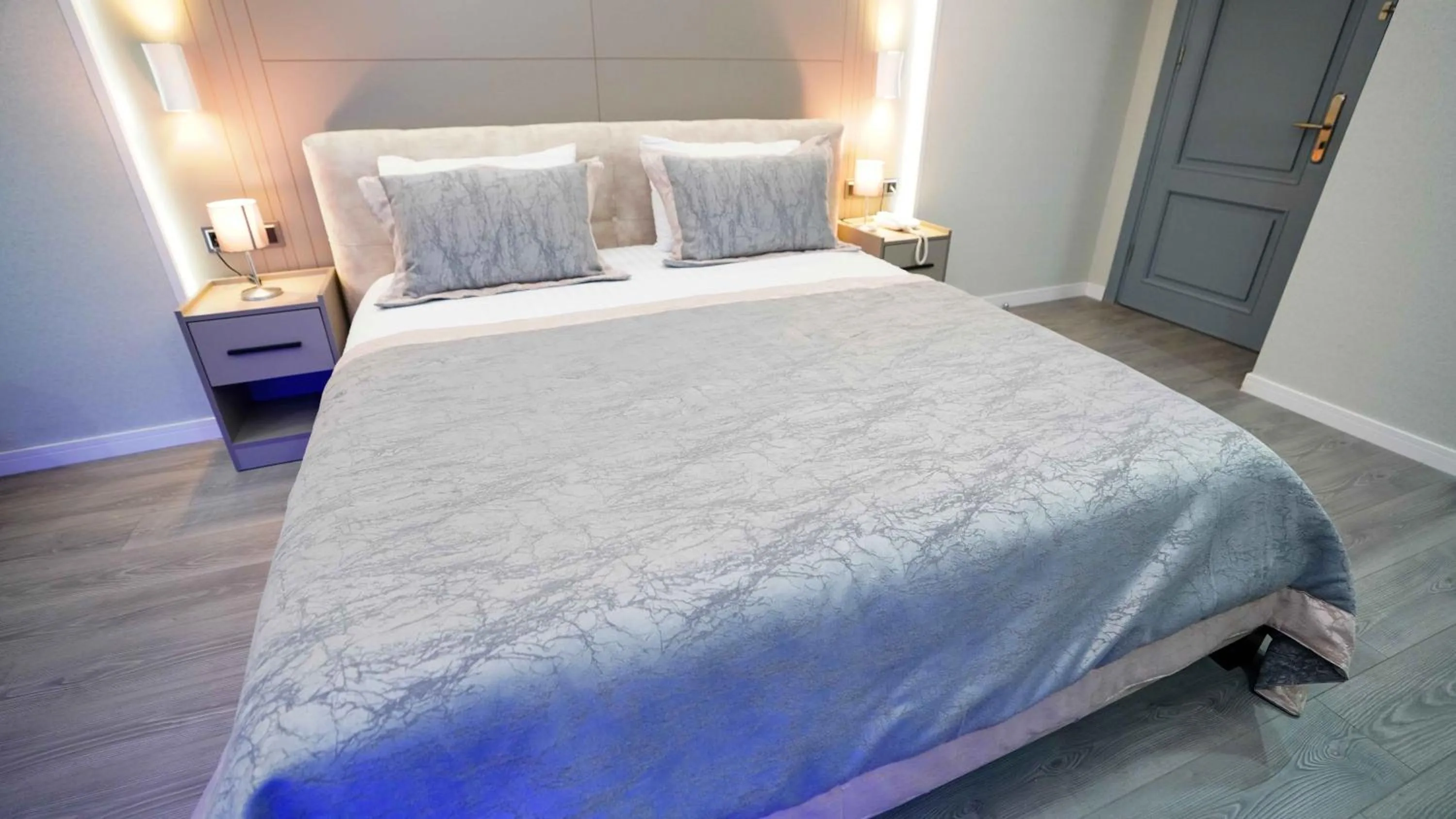 Bed in AURA MARINA HOTEL