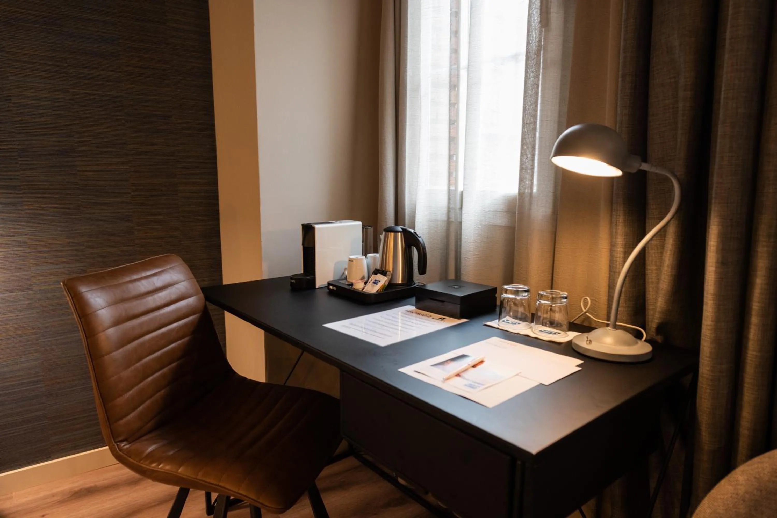 Seating area in Atenea Rekord Suites Barcelona