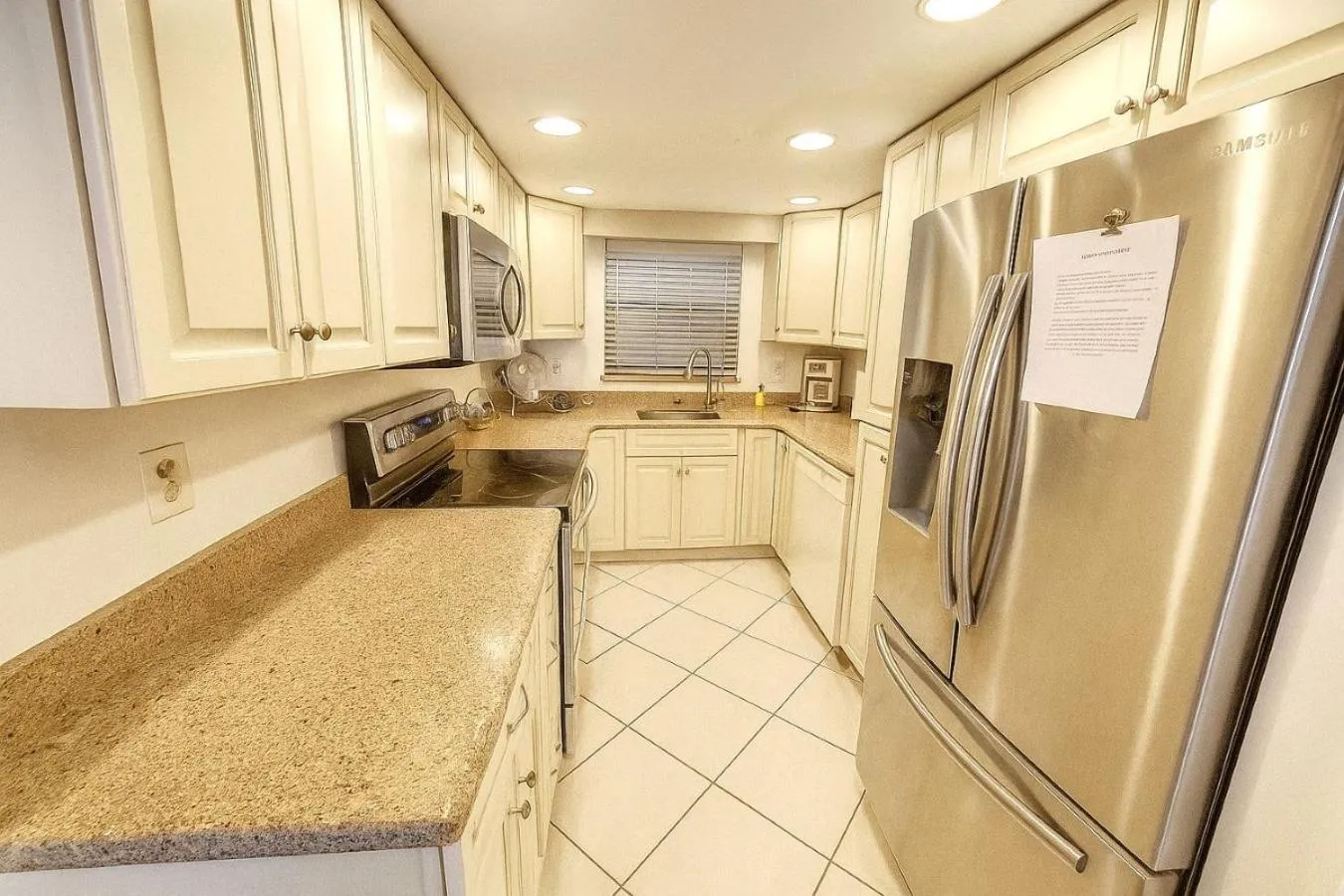 Kitchen or kitchenette in Welcome to Oasis #21 Your Coastal Retreat in Daytona Beach Shores-Walk To The Beach