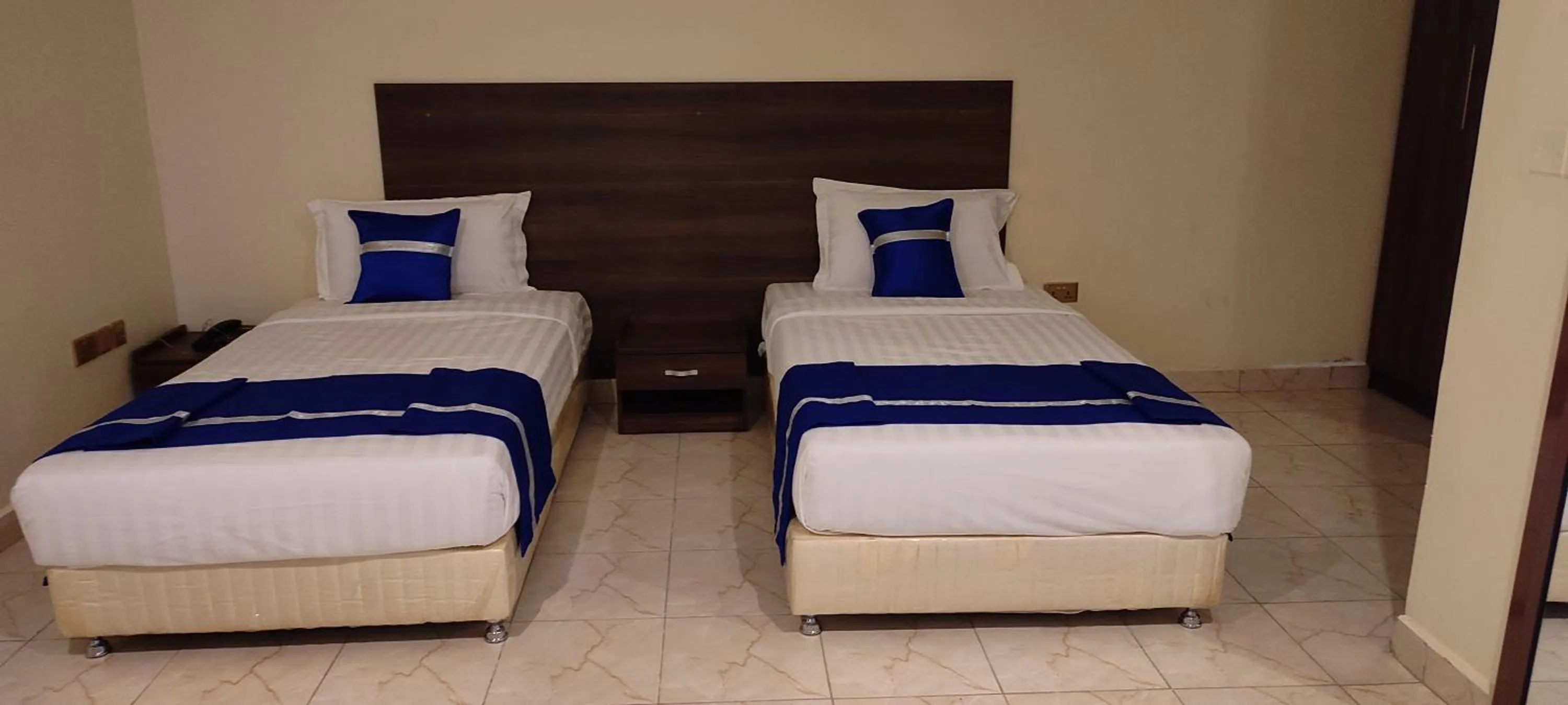 Bed in Koki Hotel